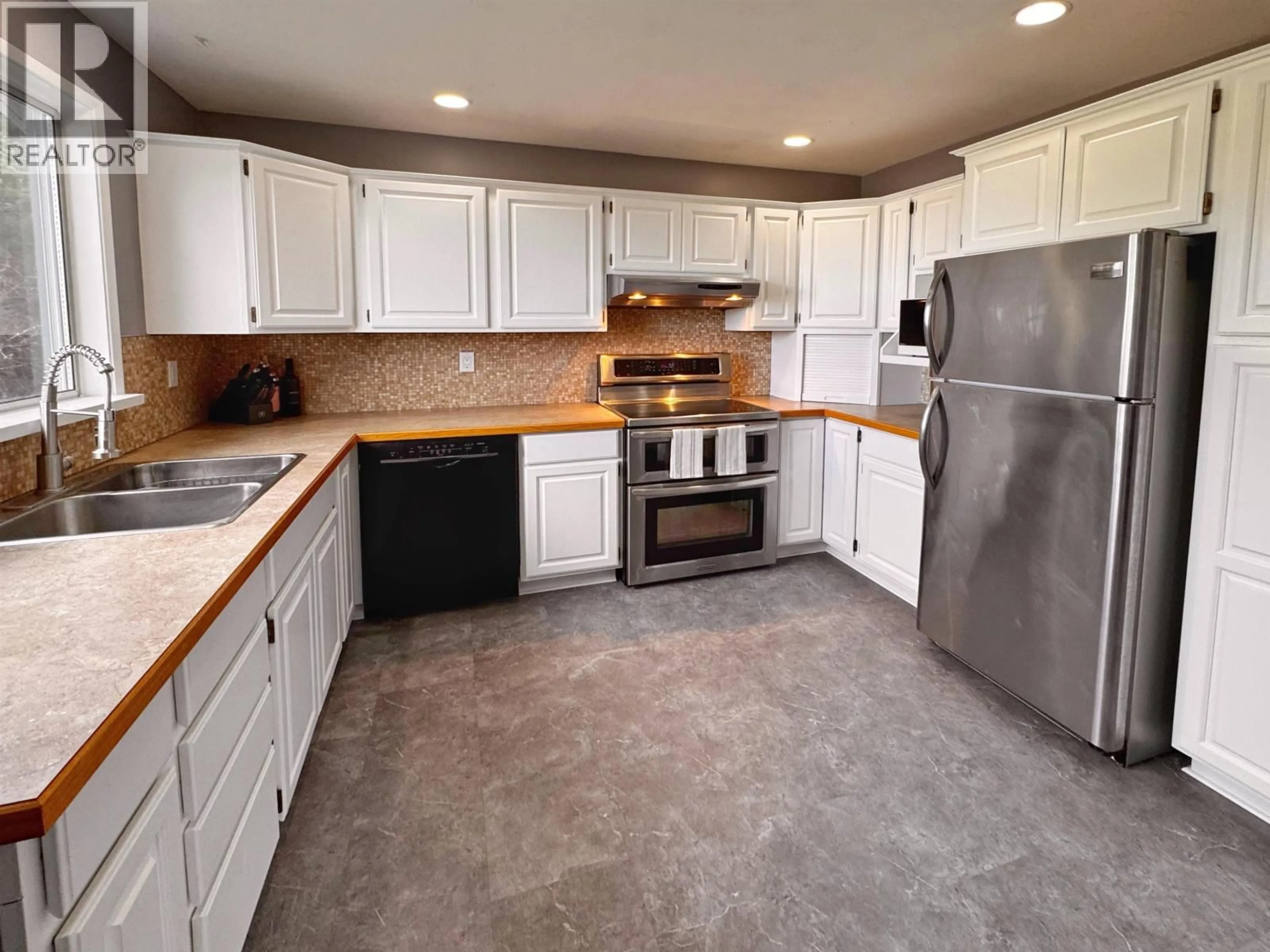 Standard kitchen, ceramic/tile floor for 121 CADE PLACE, Prince Rupert British Columbia V8J3S6