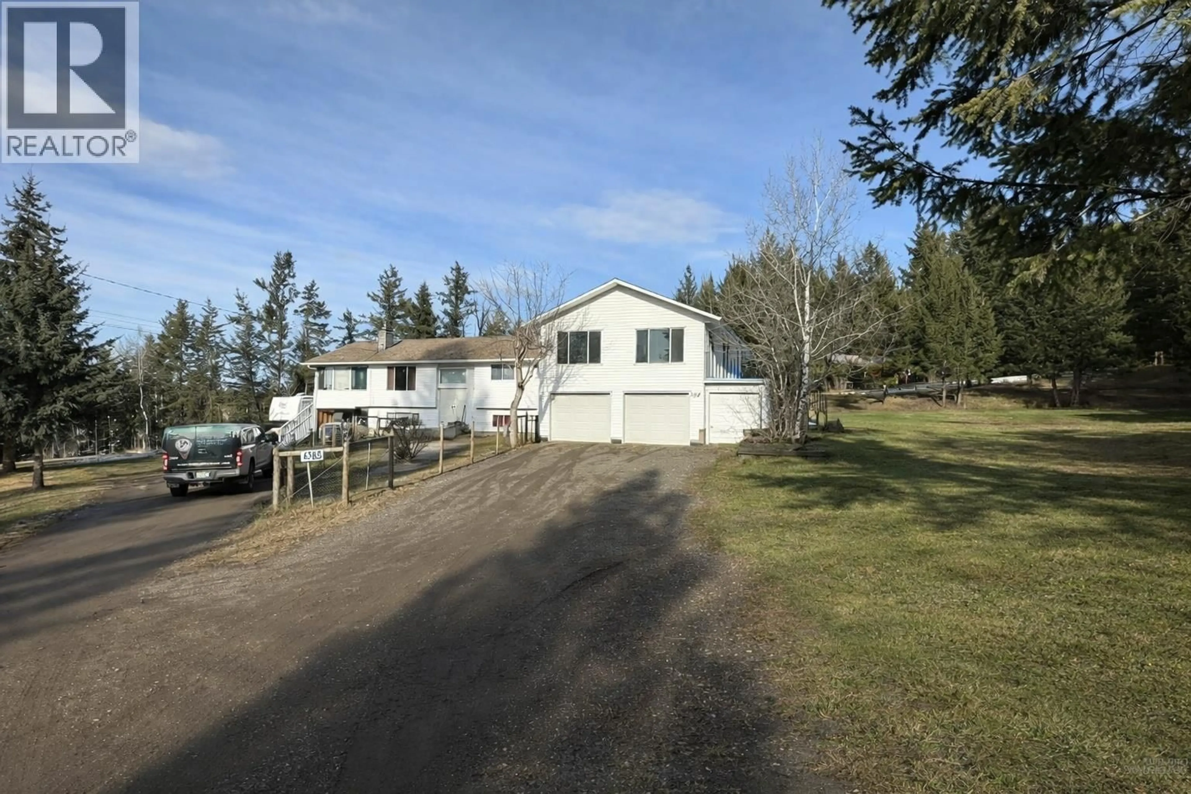 A pic from outside/outdoor area/front of a property/back of a property/a pic from drone, unknown for 4765 TELQUA DRIVE, 108 Mile Ranch British Columbia V0K2Z0