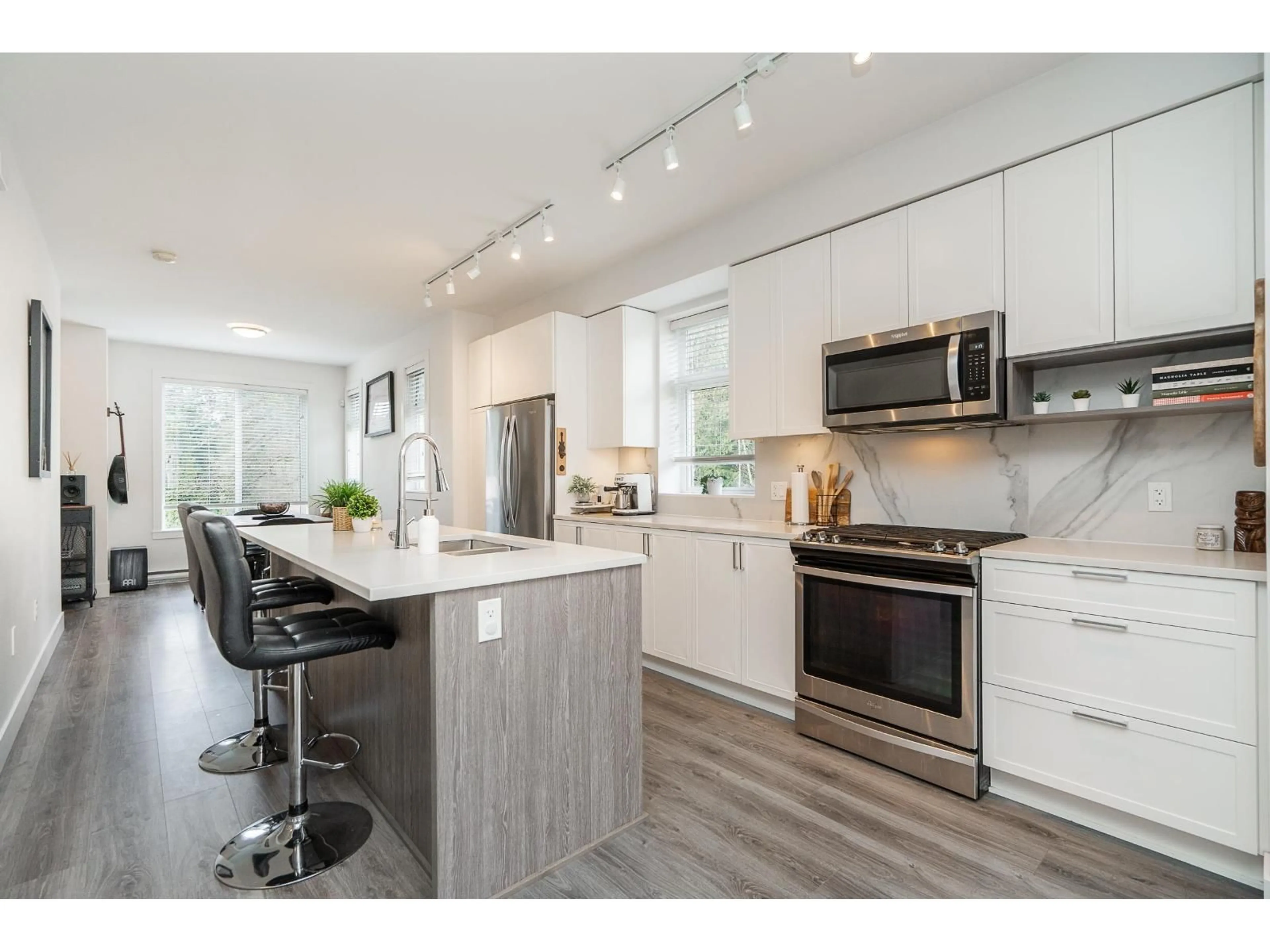 Open concept kitchen, wood/laminate floor for 22 - 9718 161A STREET, Surrey British Columbia V4N6S7
