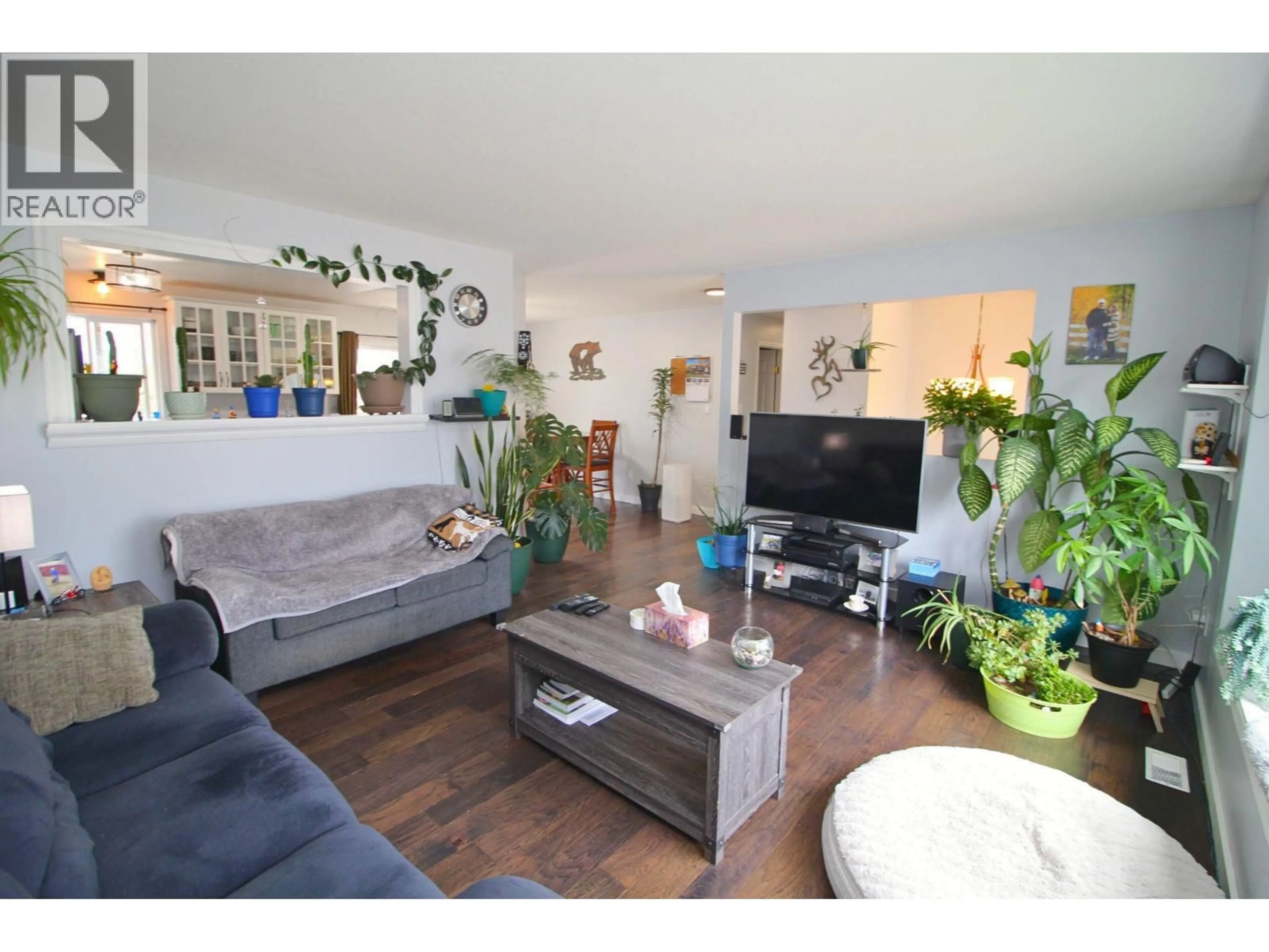 Living room with furniture, wood/laminate floor for 2865 ELLIOTT CRESCENT, Houston British Columbia V0J1Z0