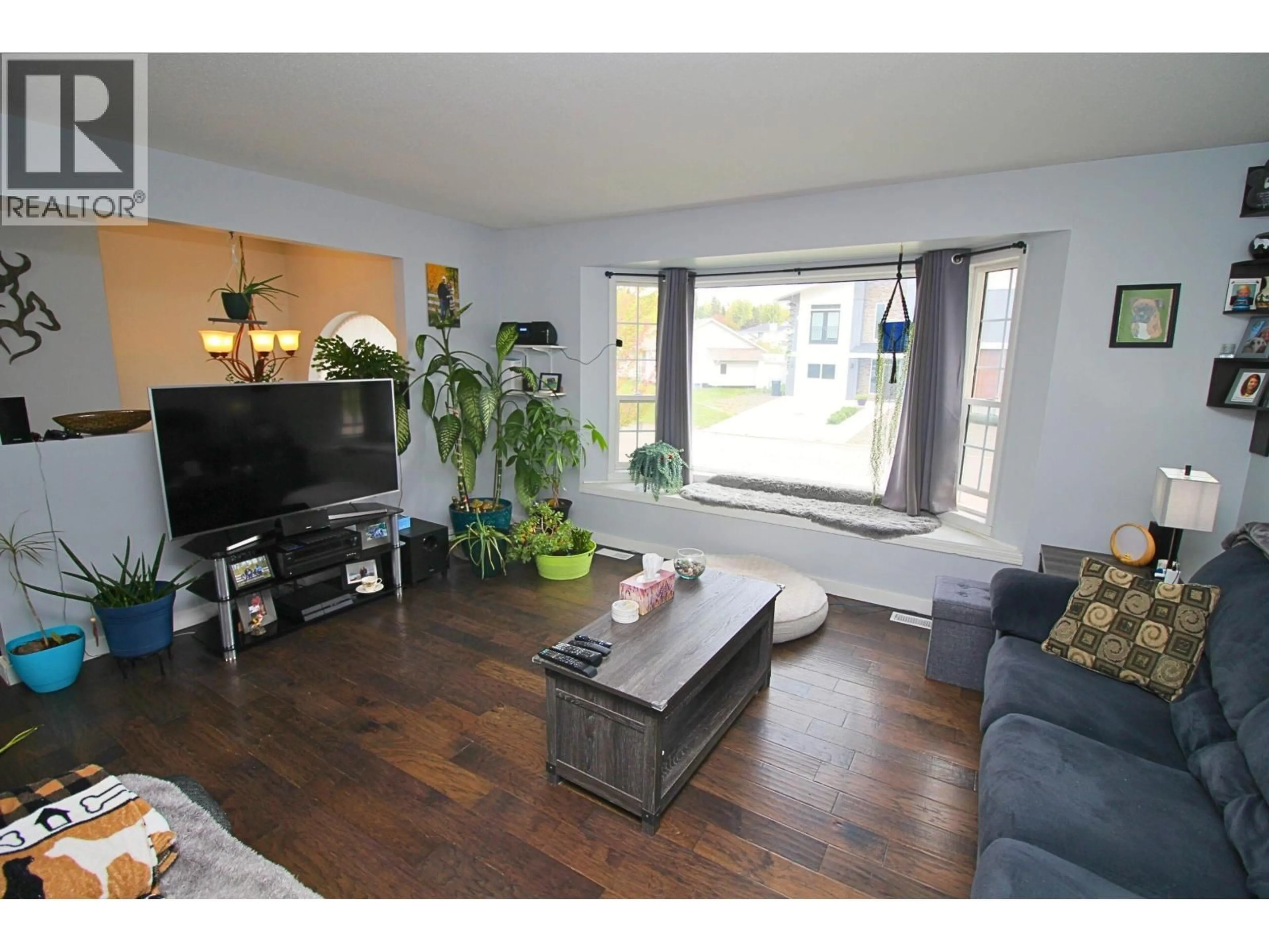 Living room with furniture, wood/laminate floor for 2865 ELLIOTT CRESCENT, Houston British Columbia V0J1Z0