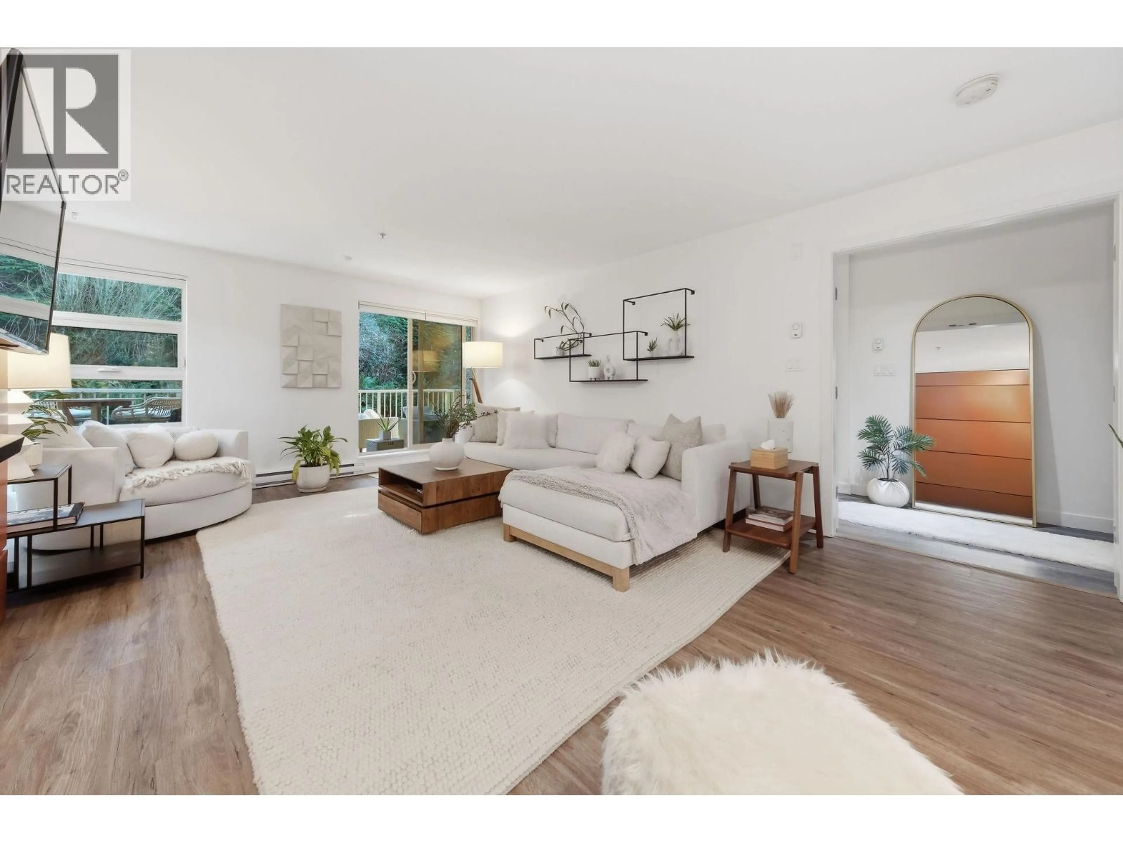 Living room with furniture, unknown for 105 - 2832 CAPILANO ROAD, North Vancouver British Columbia V7R4H5