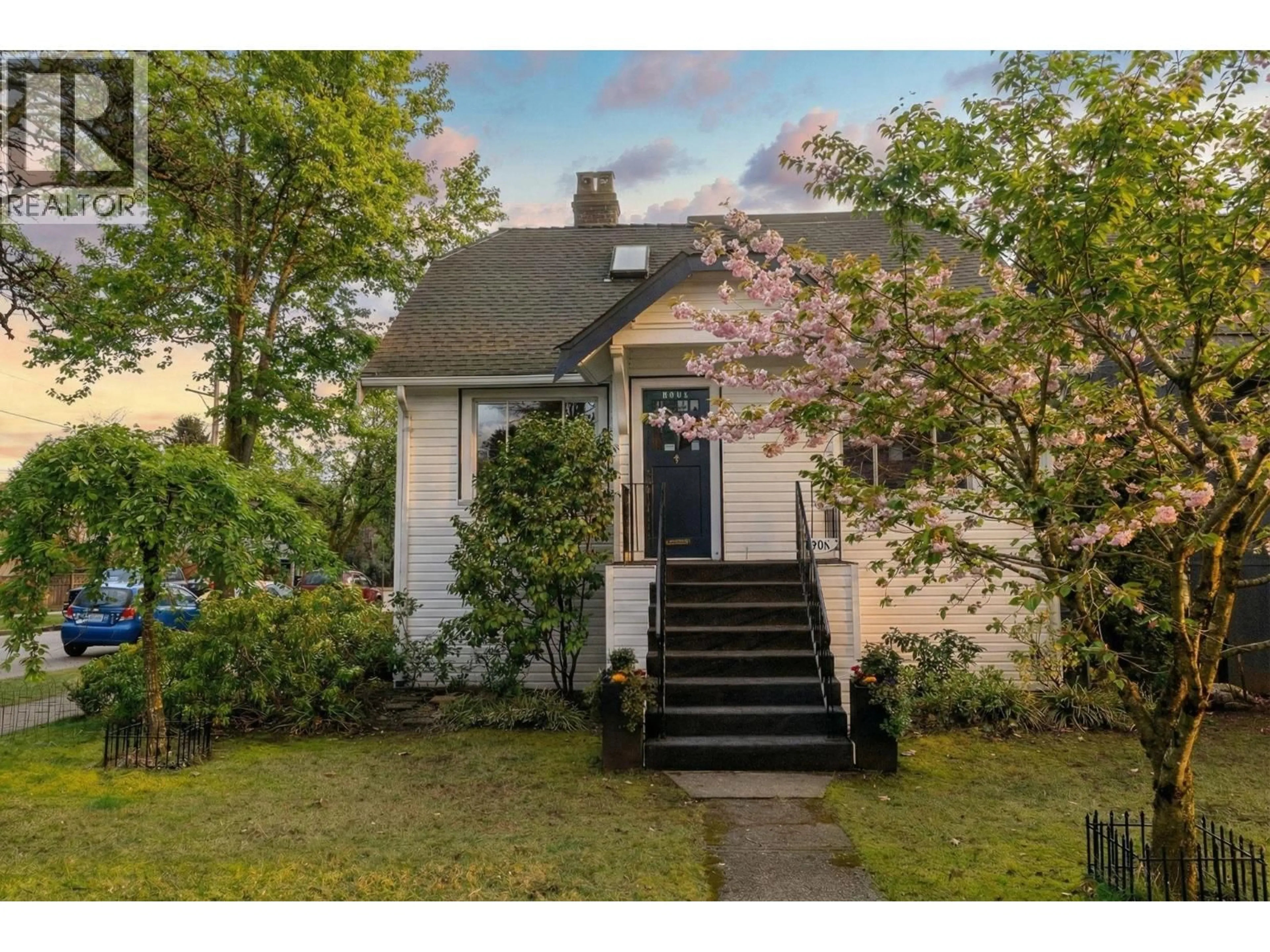 Home with vinyl exterior material, street for 2094 7TH AVENUE, Vancouver British Columbia V5N1S6