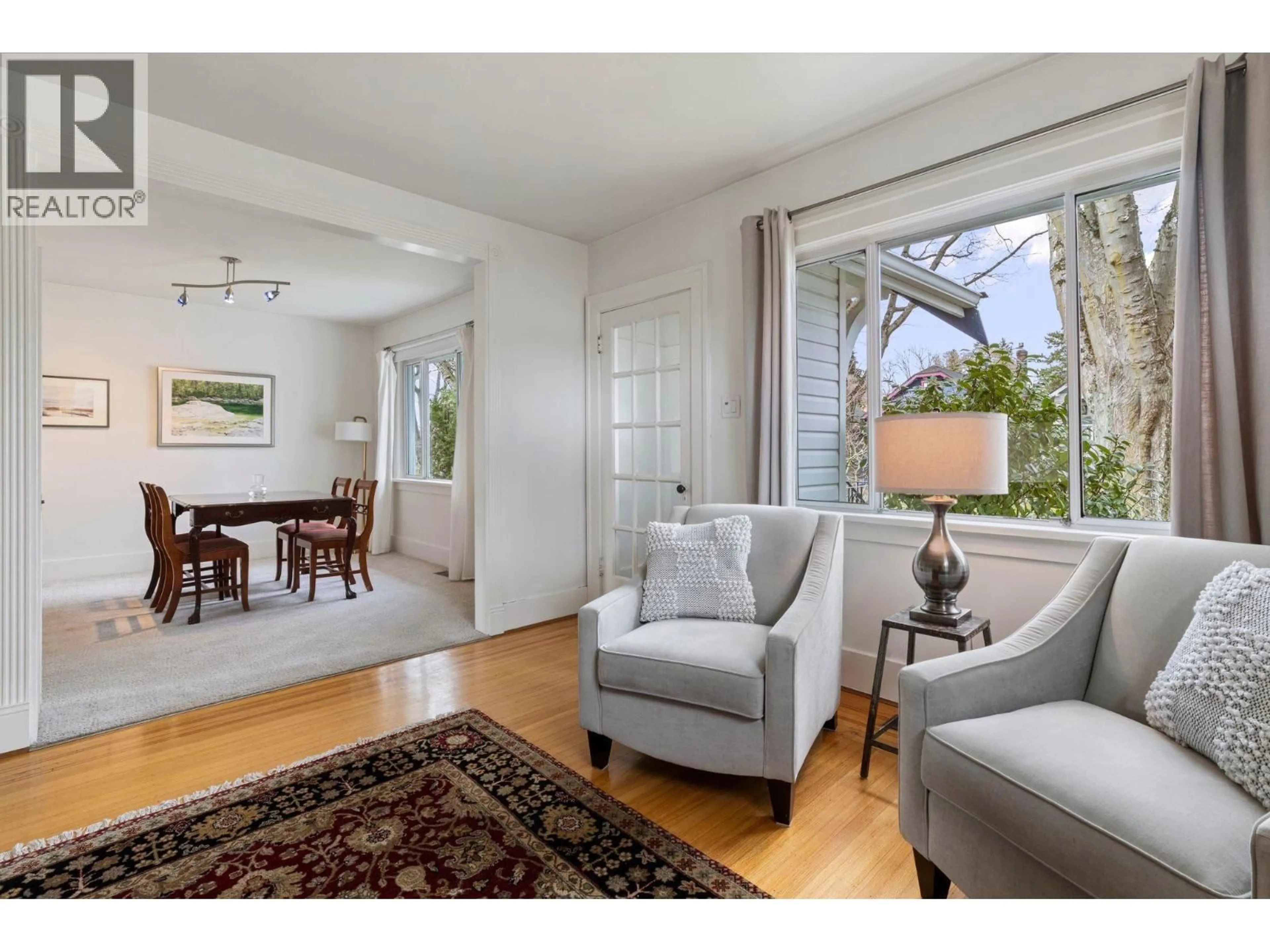 Living room with furniture, wood/laminate floor for 2094 7TH AVENUE, Vancouver British Columbia V5N1S6