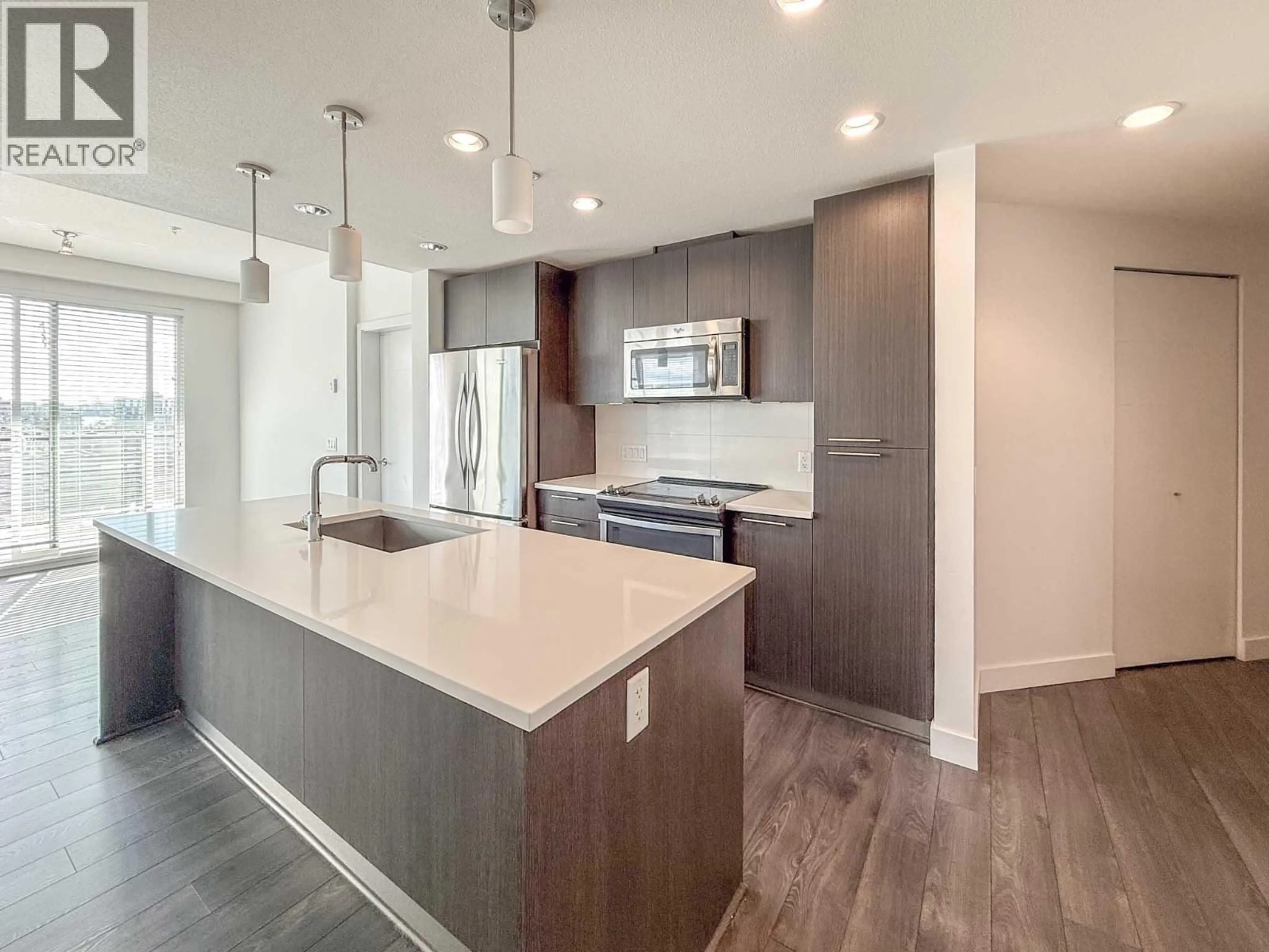 Open concept kitchen, unknown for 524 - 723 3RD STREET, North Vancouver British Columbia V7M0E4