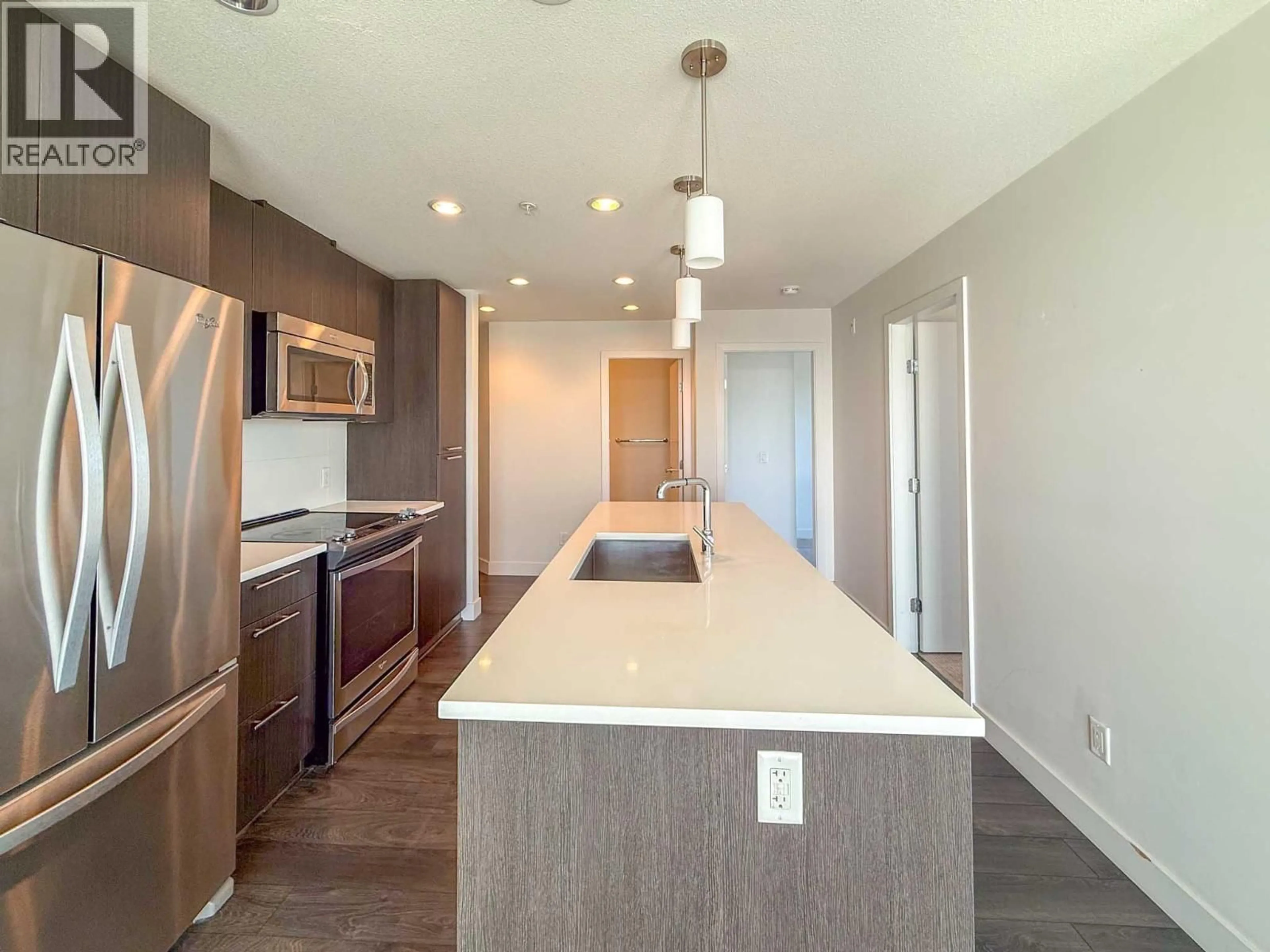 Open concept kitchen, unknown for 524 - 723 3RD STREET, North Vancouver British Columbia V7M0E4