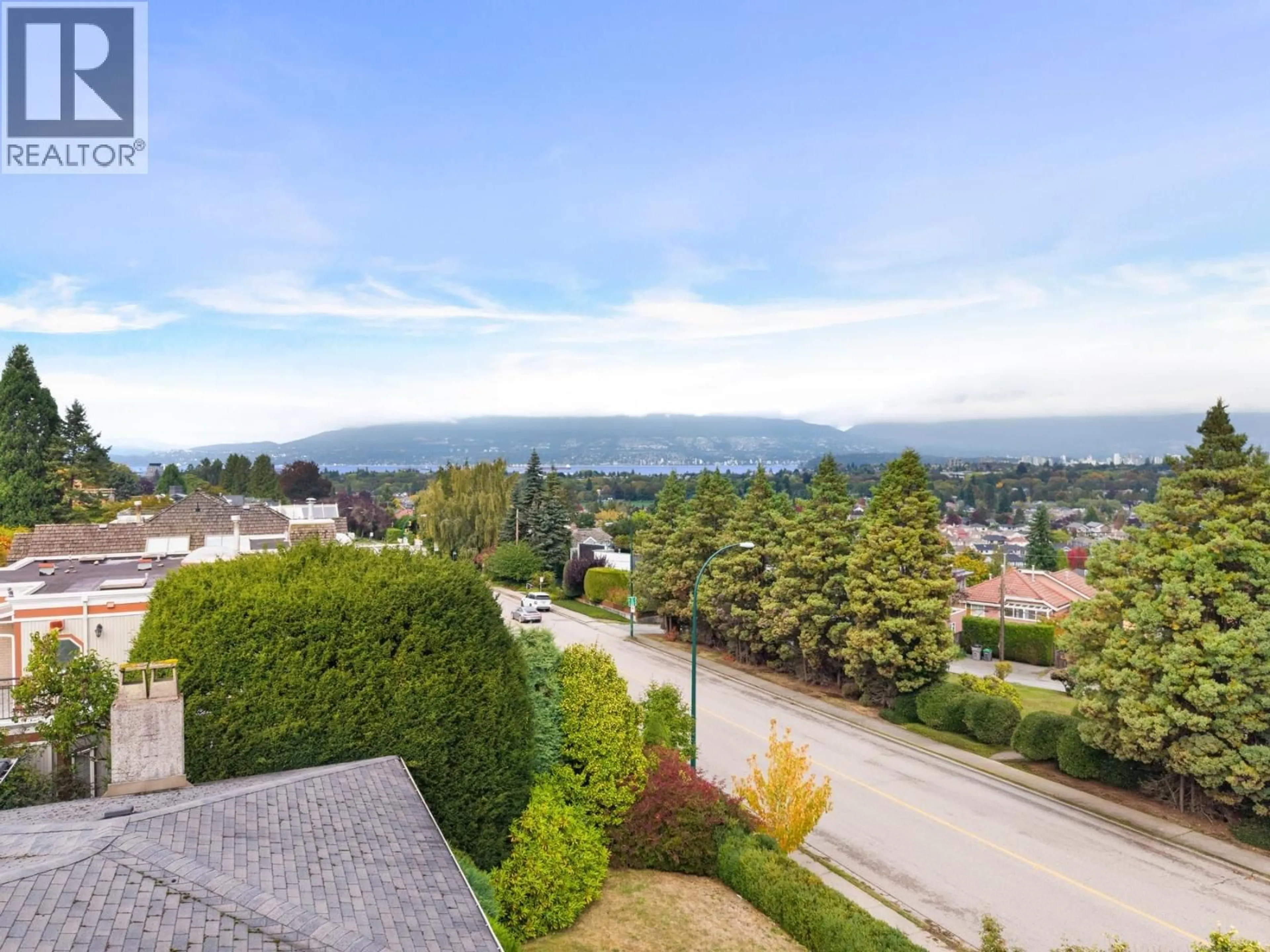 A pic from outside/outdoor area/front of a property/back of a property/a pic from drone, mountain view for 4275 QUESNEL DRIVE, Vancouver British Columbia V6L2X5