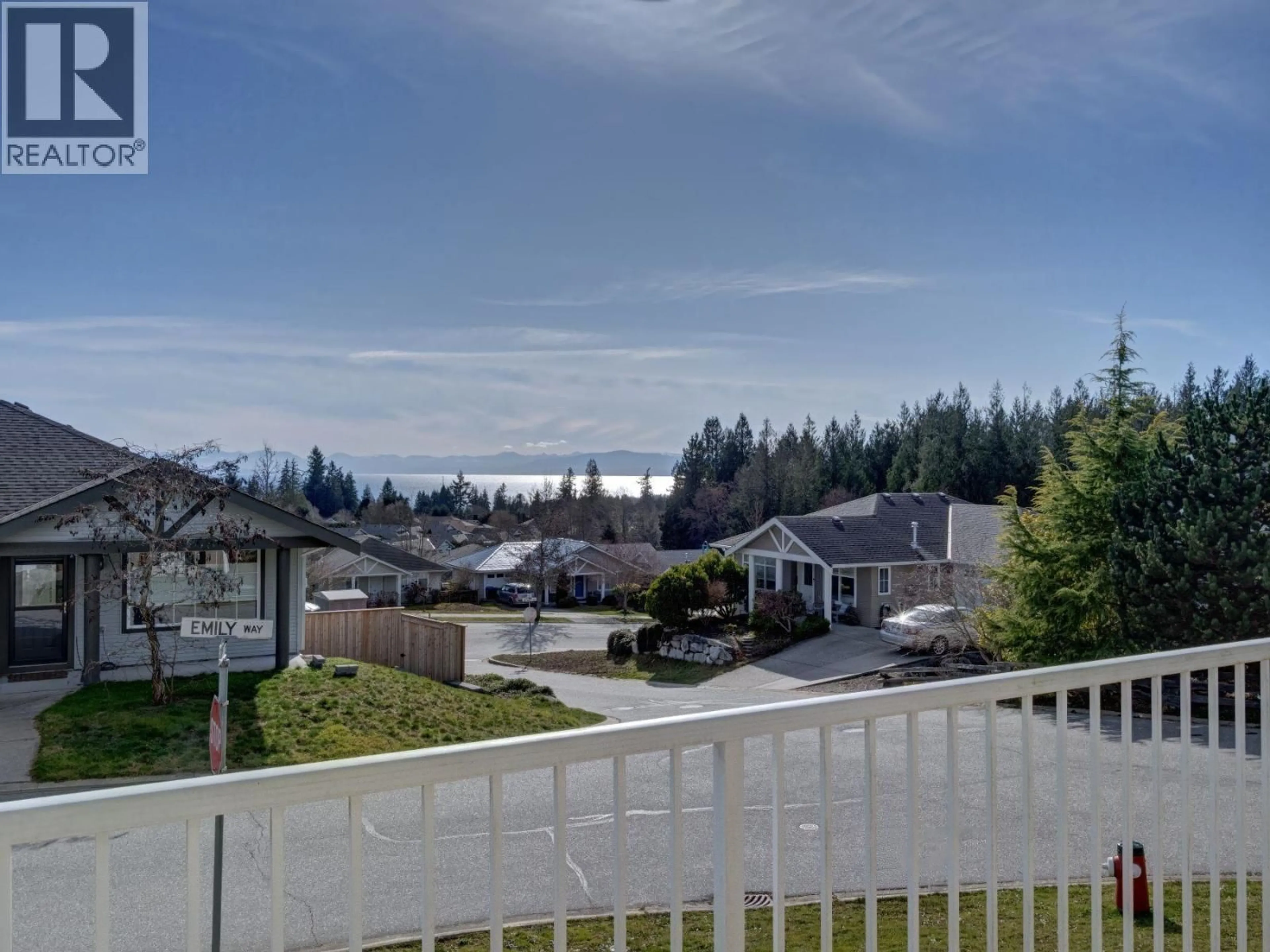 A pic from outside/outdoor area/front of a property/back of a property/a pic from drone, water/lake/river/ocean view for 5683 EMILY WAY, Sechelt British Columbia V7Z0N5
