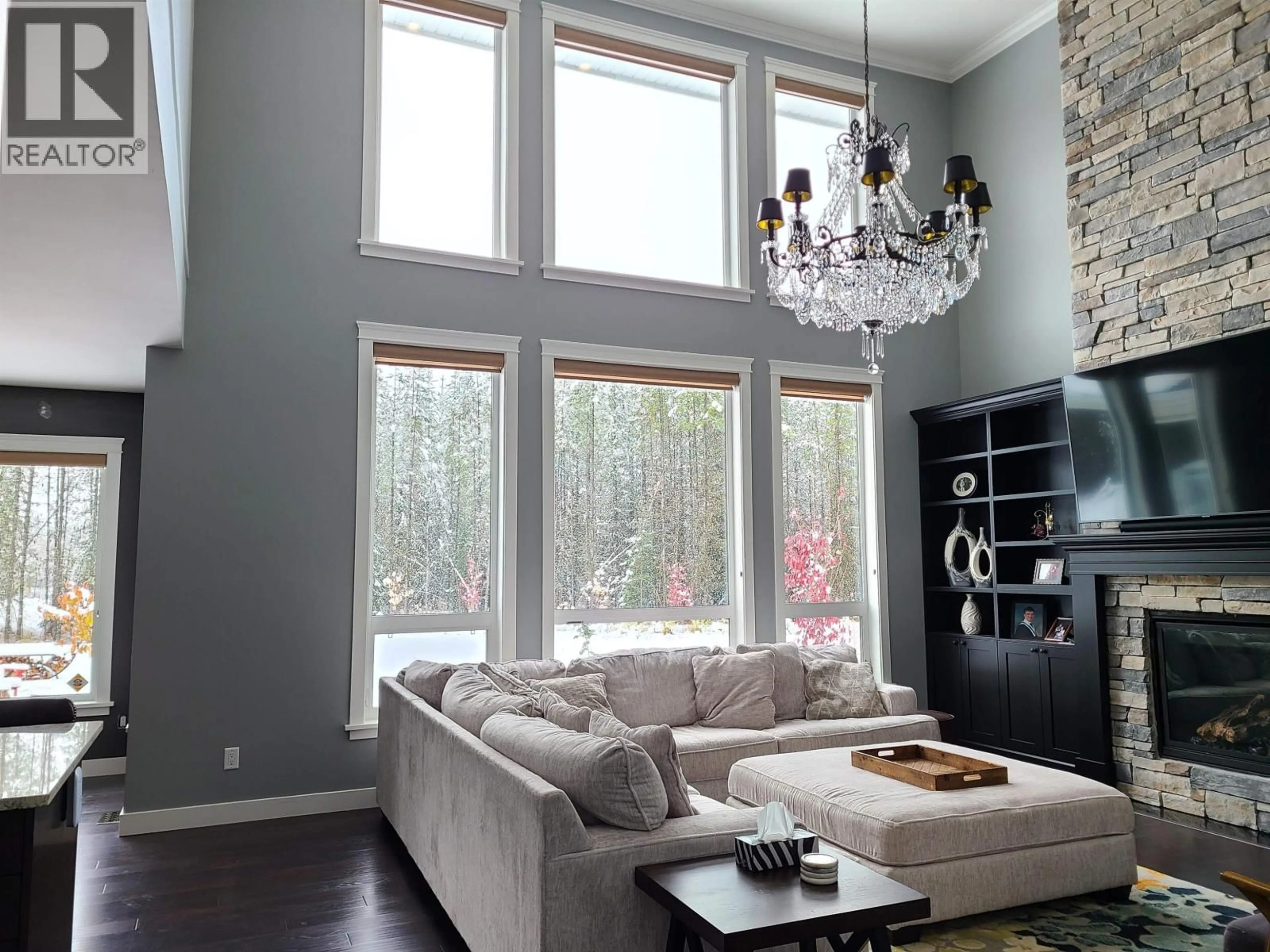 Living room with furniture, wood/laminate floor for 10888 LOLLAND CRESCENT, Prince George British Columbia V2N6L3