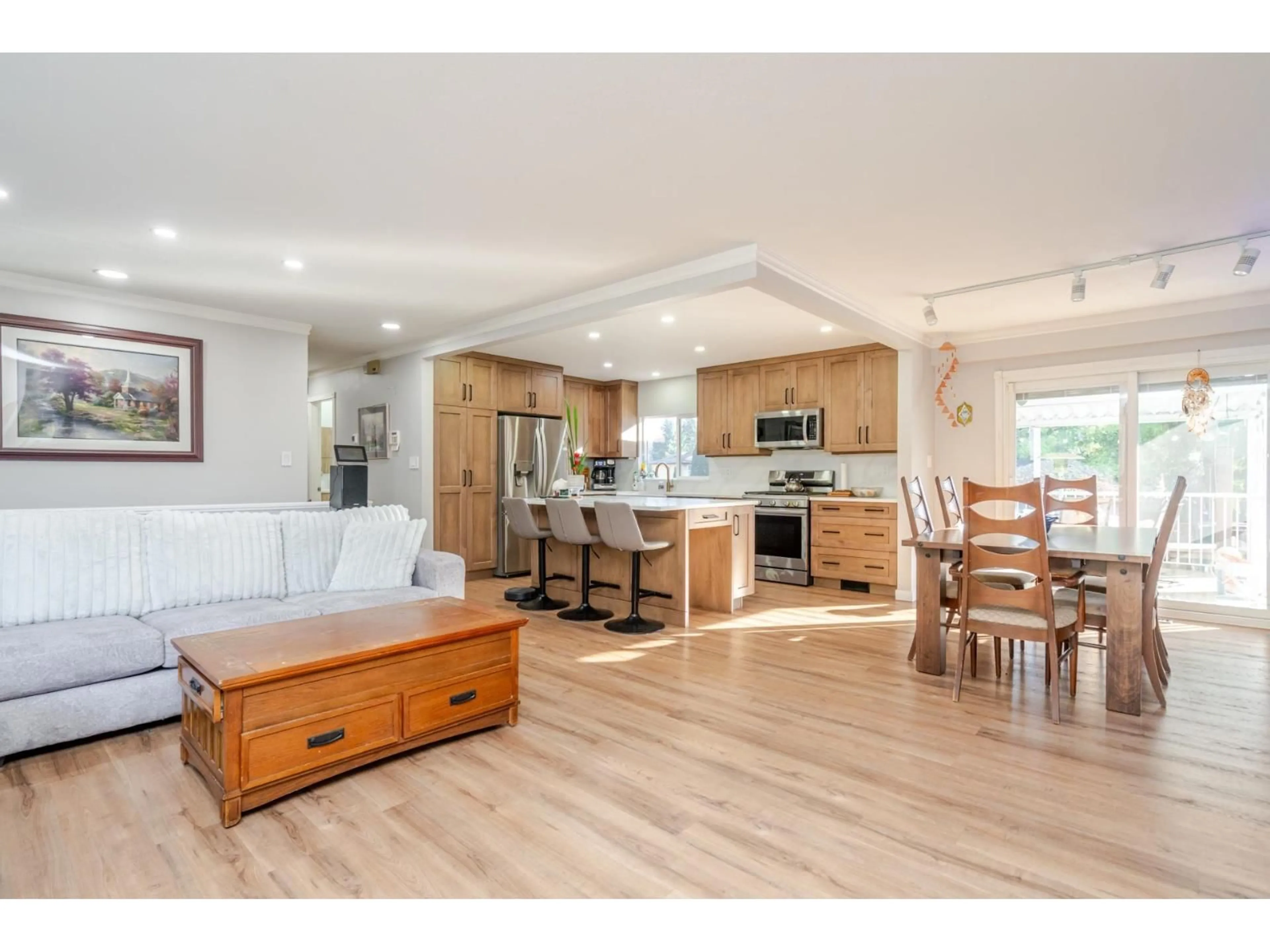 Open concept kitchen, wood/laminate floor for 3924 205B STREET, Langley British Columbia V3A2B3