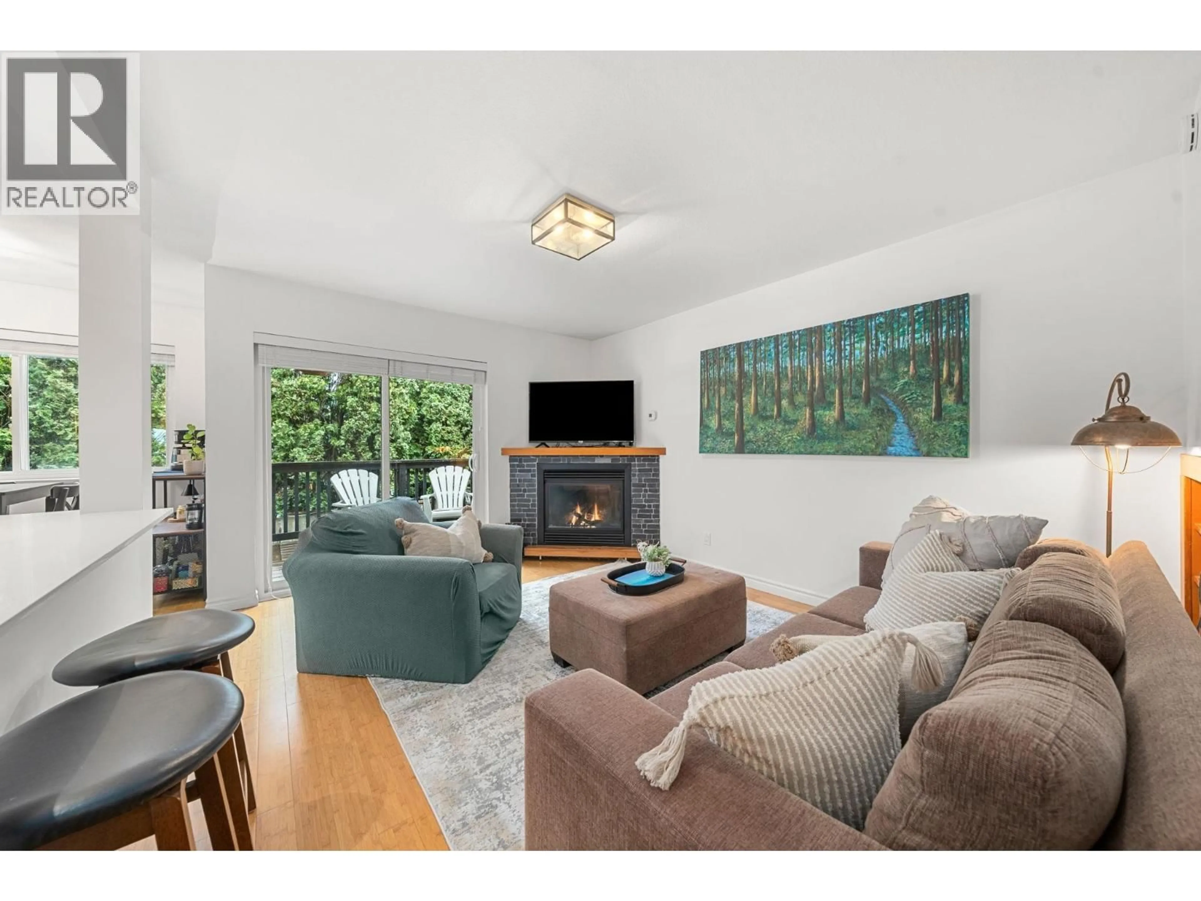 Living room with furniture, wood/laminate floor for 3 - 1700 MAMQUAM ROAD, Squamish British Columbia V8B0H7