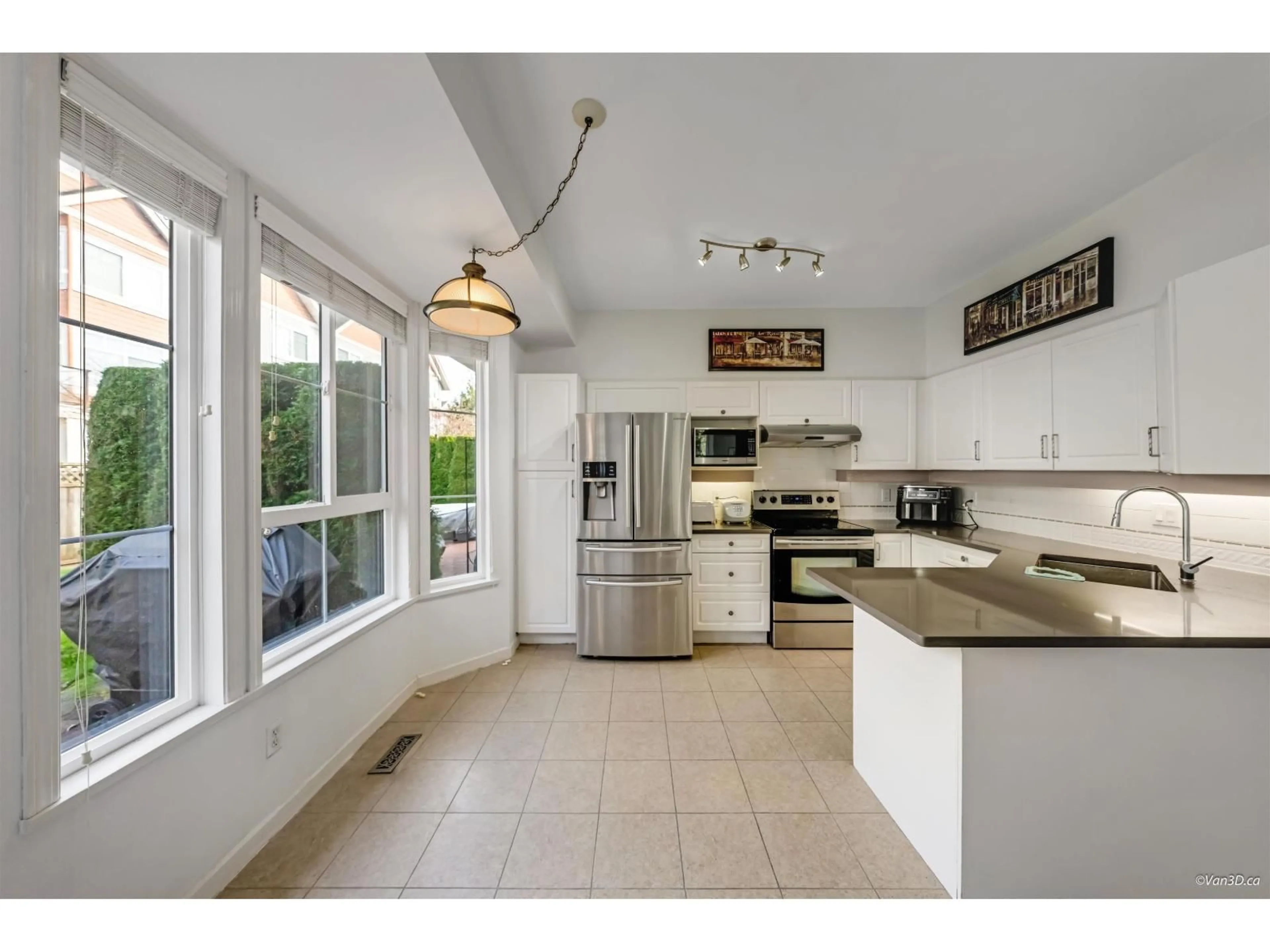 Open concept kitchen, ceramic/tile floor for 56 - 6950 120 STREET, Surrey British Columbia V3W3M7