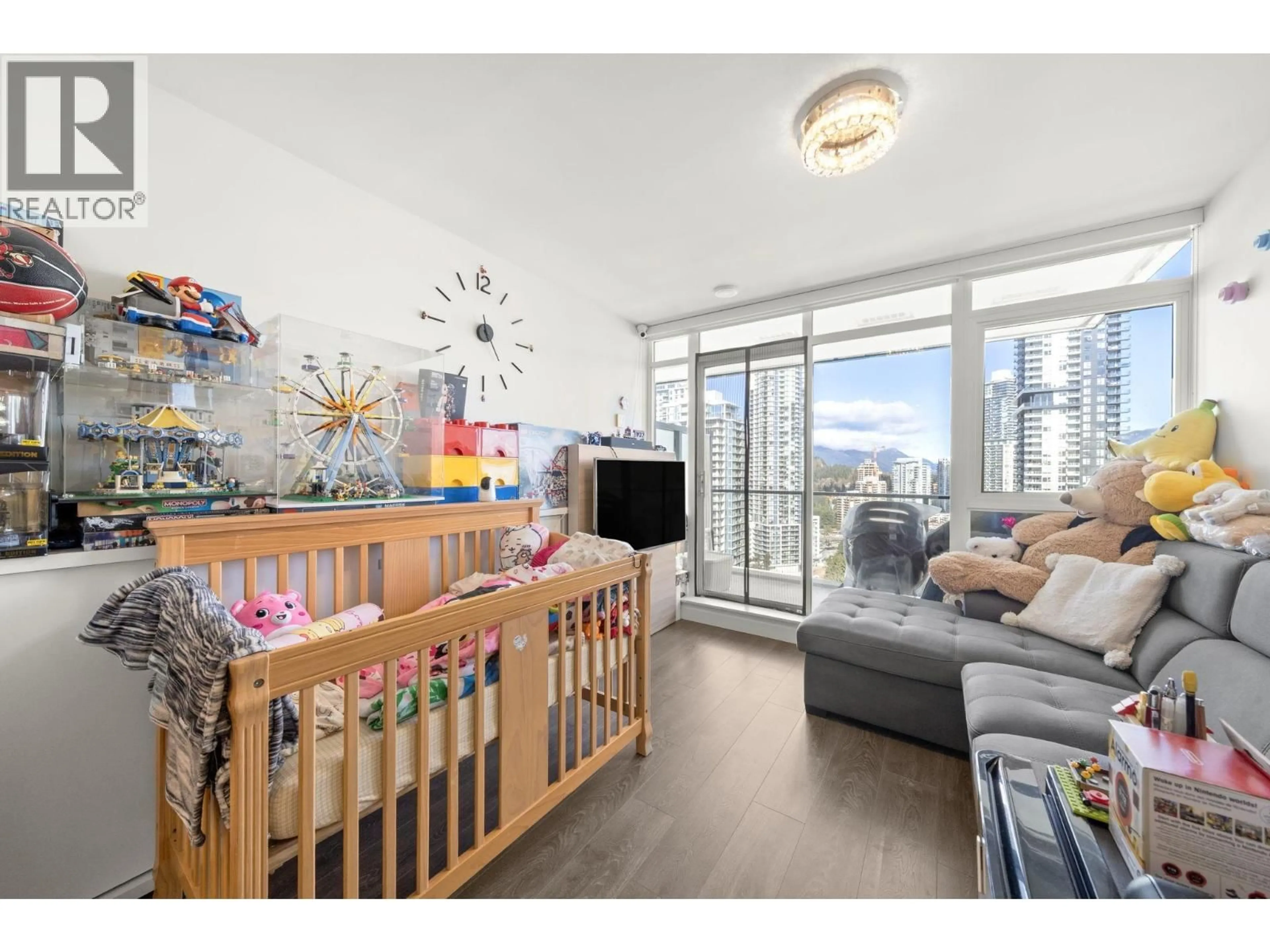 Living room with furniture, wood/laminate floor for 2206 - 525 FOSTER AVENUE, Coquitlam British Columbia V3J0H6