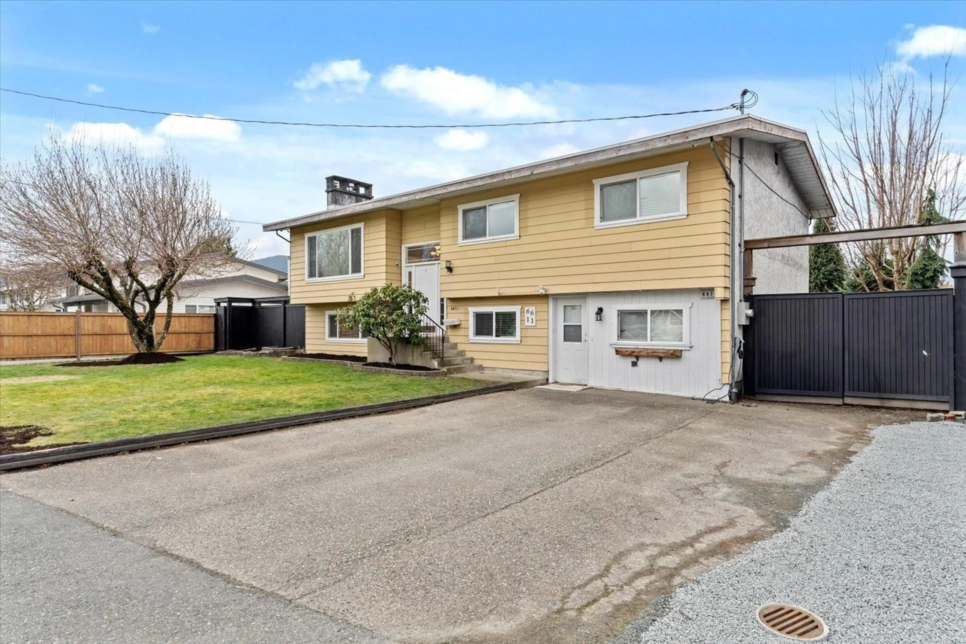 Home with vinyl exterior material, street for 6611 REID ROAD, Chilliwack British Columbia V2R2Z8