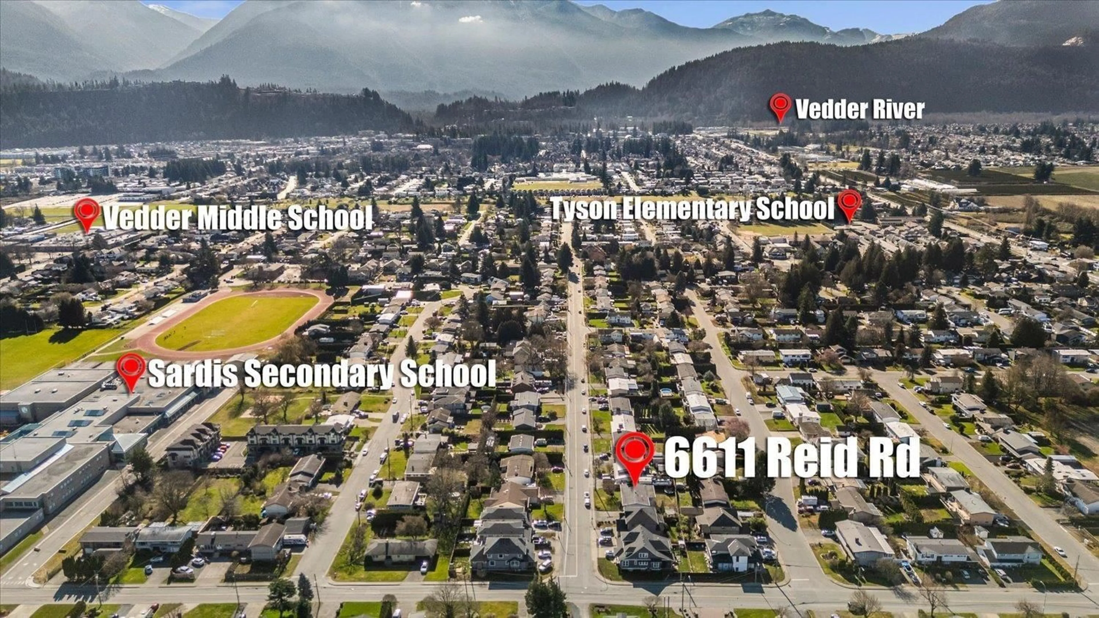 A pic from outside/outdoor area/front of a property/back of a property/a pic from drone, street for 6611 REID ROAD, Chilliwack British Columbia V2R2Z8