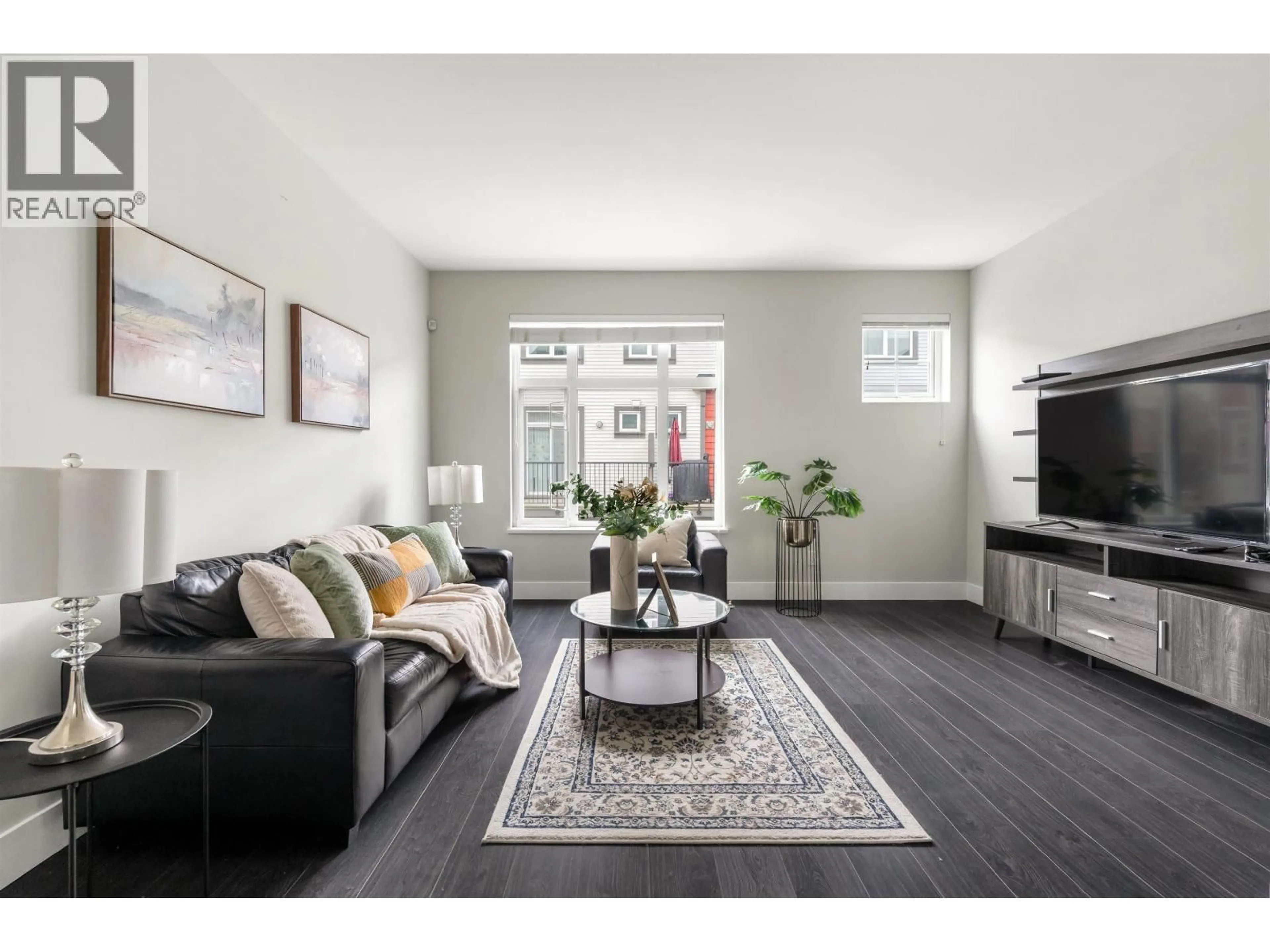 Living room with furniture, wood/laminate floor for 20 - 4588 DUBBERT STREET, Richmond British Columbia V6X0M1