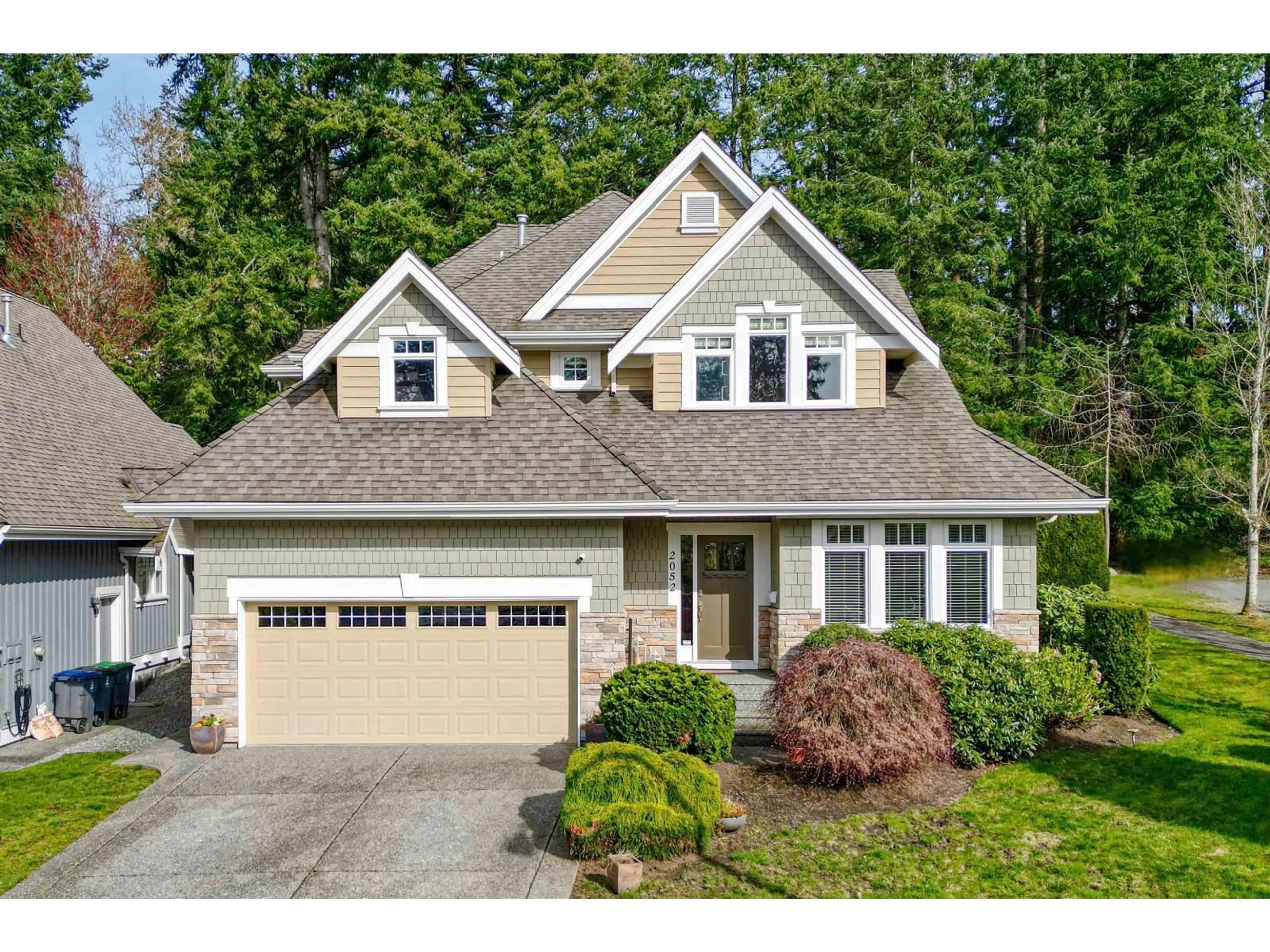 Home with vinyl exterior material, street for 2052 128A STREET, Surrey British Columbia V4A0A4