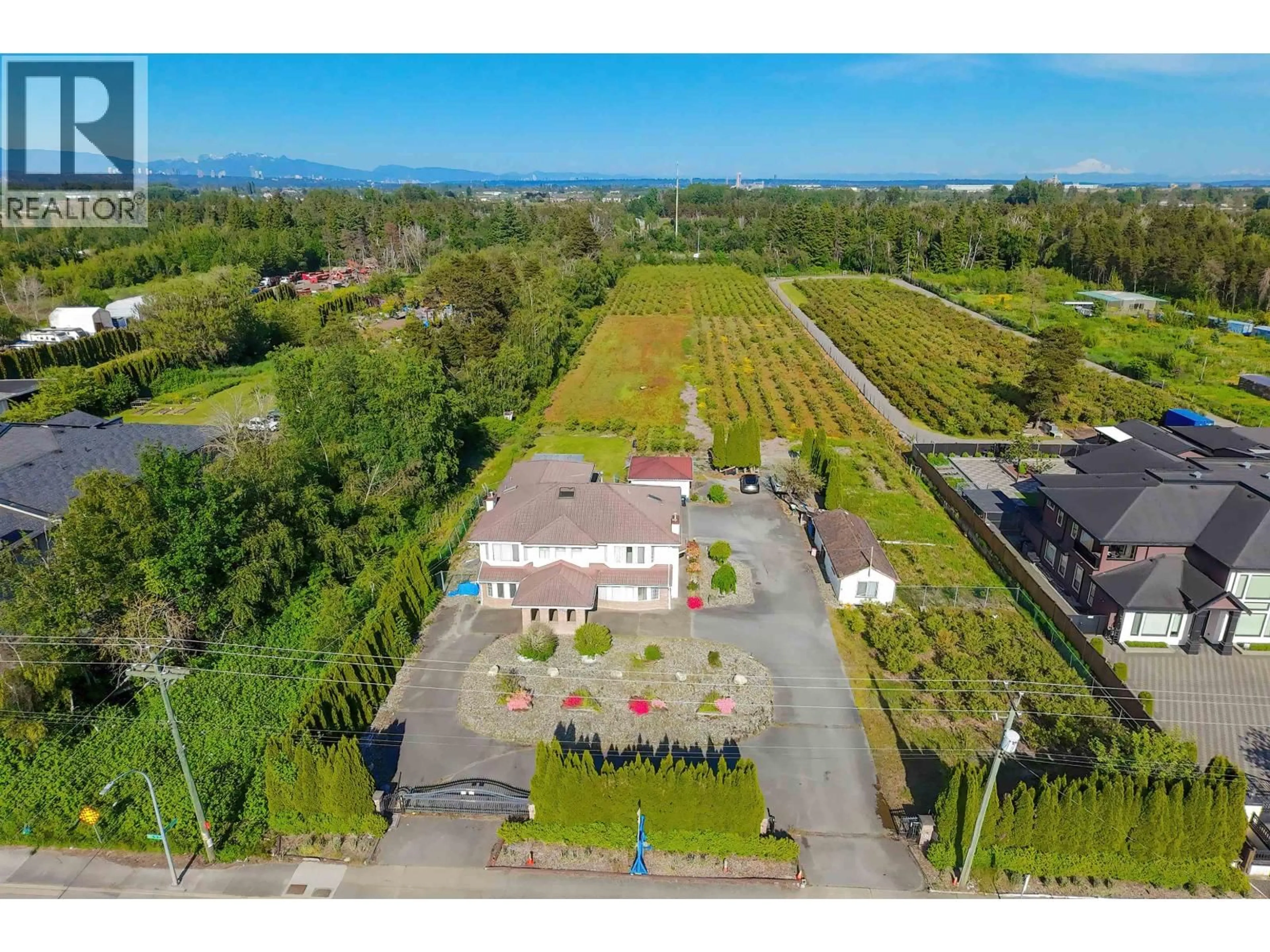 A pic from outside/outdoor area/front of a property/back of a property/a pic from drone, mountain view for 7000 NO. 5 ROAD, Richmond British Columbia V6Y2V2