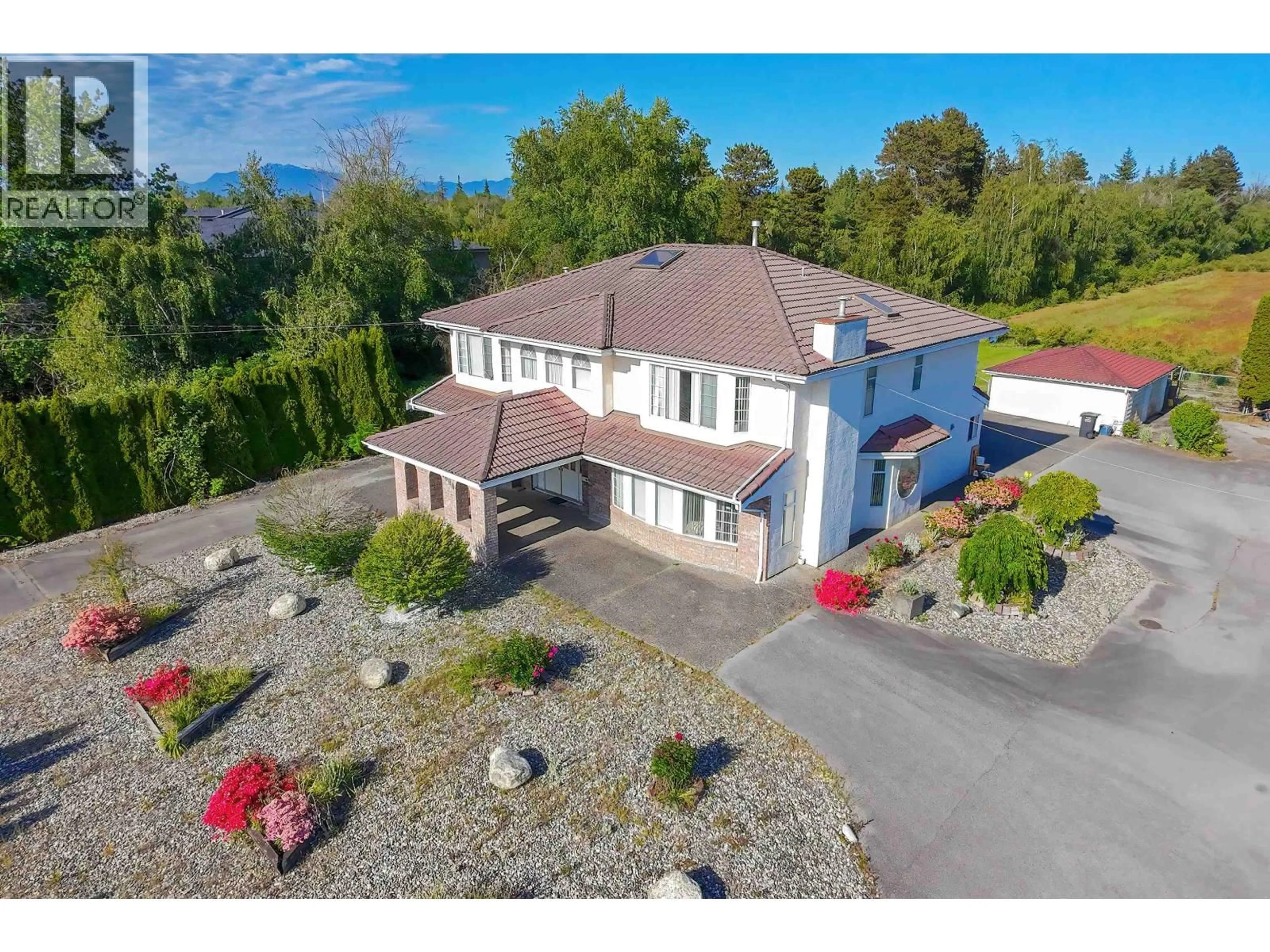 A pic from outside/outdoor area/front of a property/back of a property/a pic from drone, mountain view for 7000 NO. 5 ROAD, Richmond British Columbia V6Y2V2