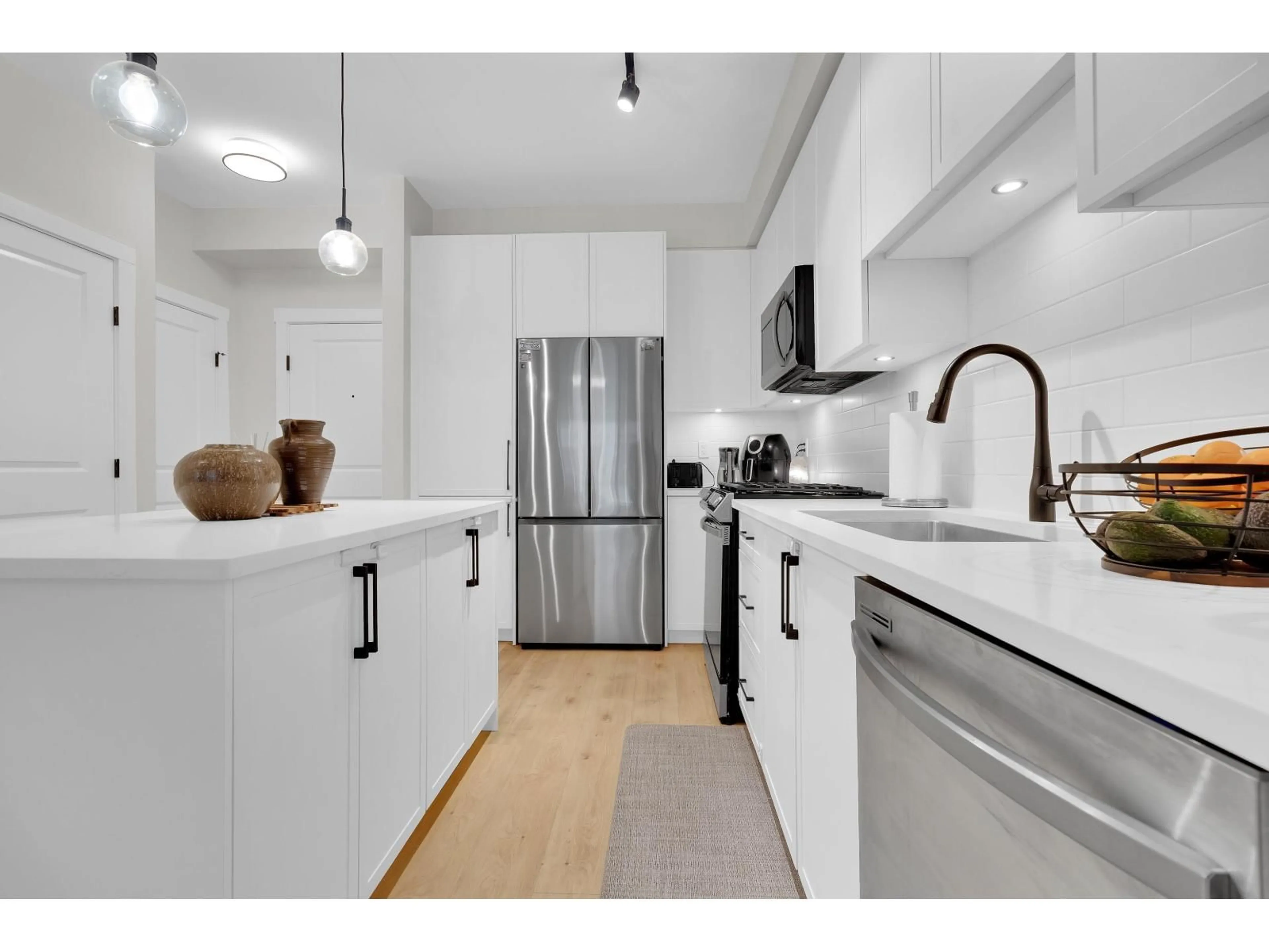 Open concept kitchen, unknown for 320 - 7506 199A STREET, Langley British Columbia V2Y3K9