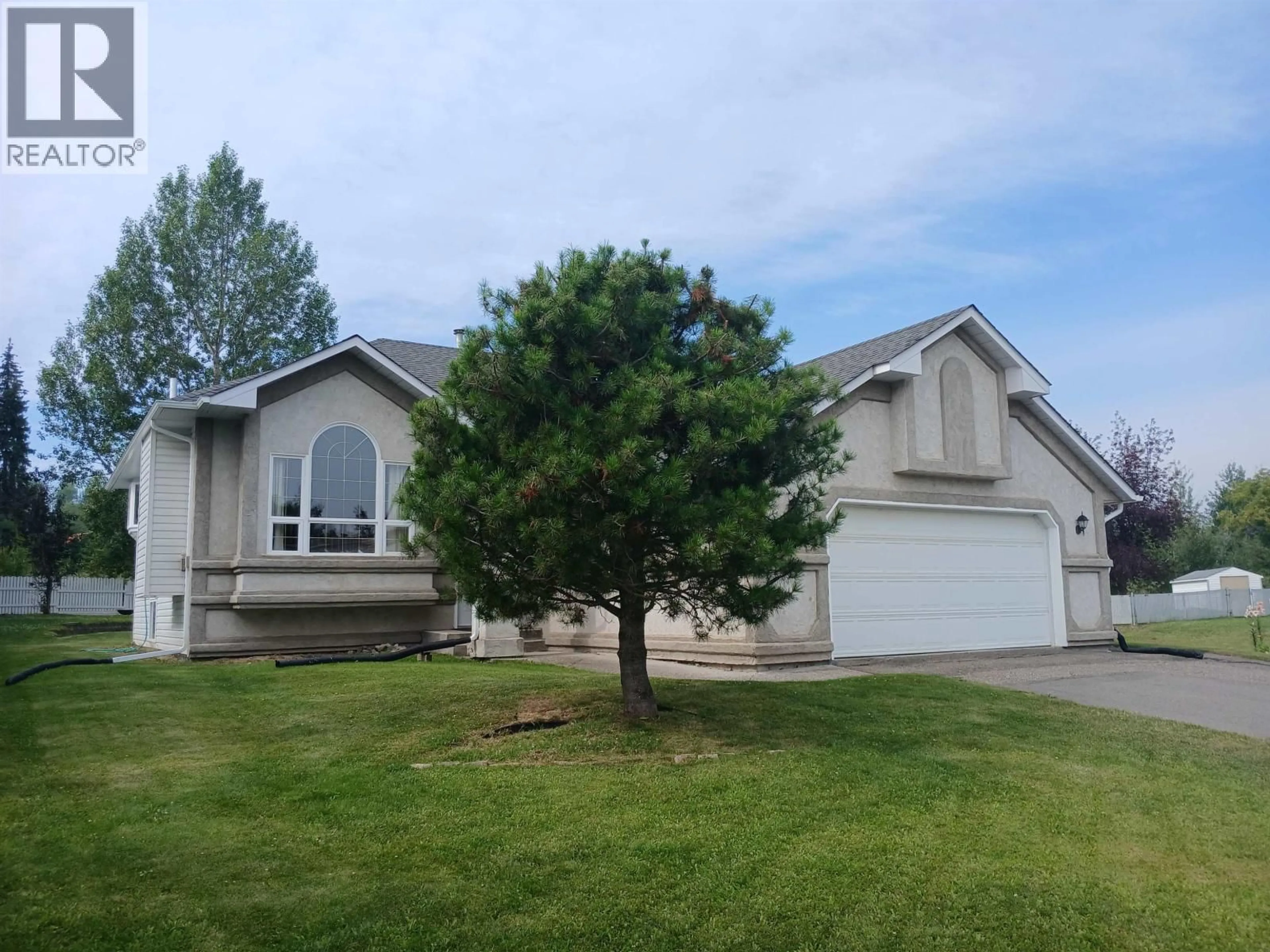 Home with vinyl exterior material, street for 5486 HEYER ROAD, Prince George British Columbia V2N6J3