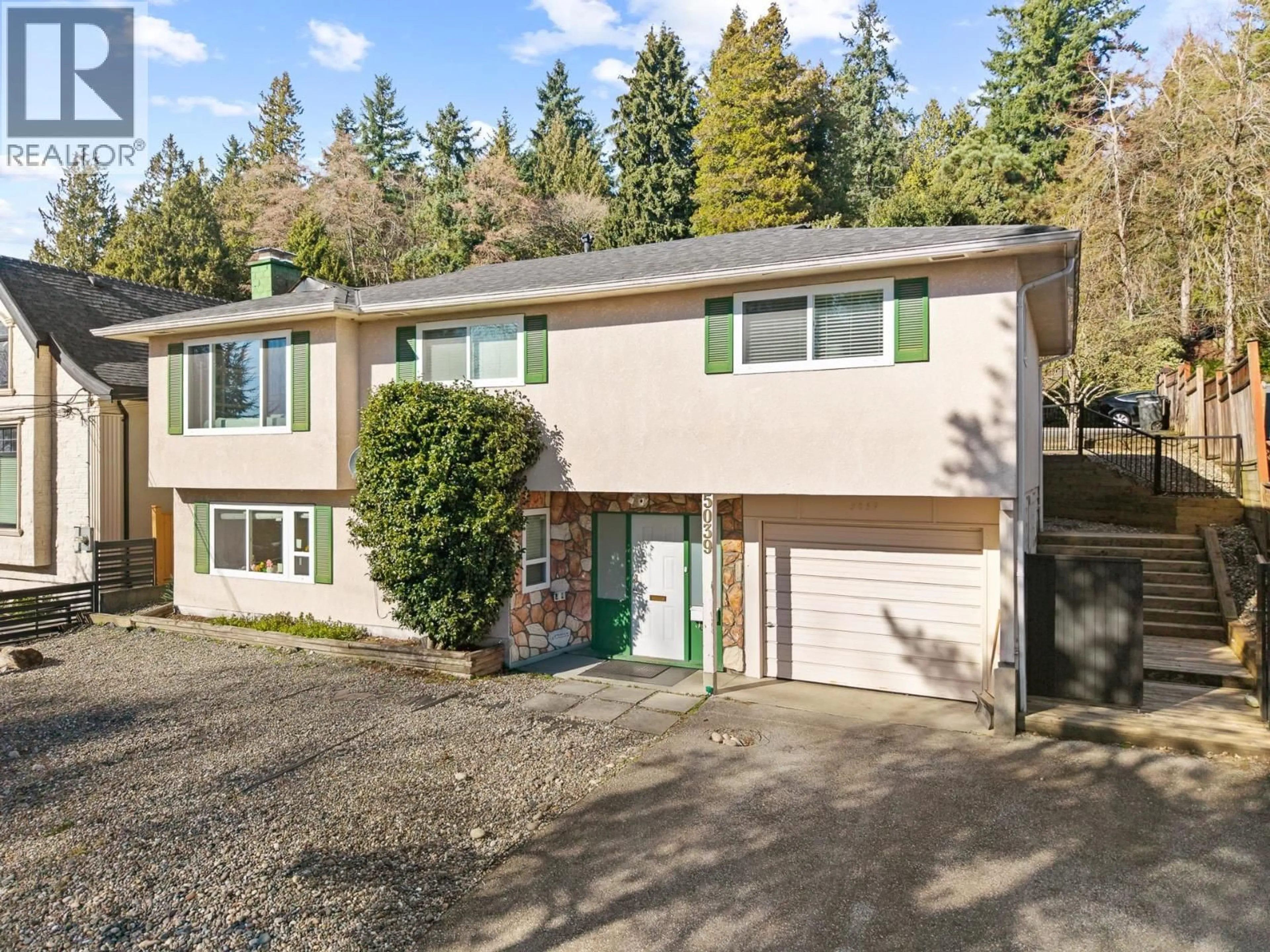 Home with vinyl exterior material, street for 5039 MARINE DRIVE, Burnaby British Columbia V5J3G5