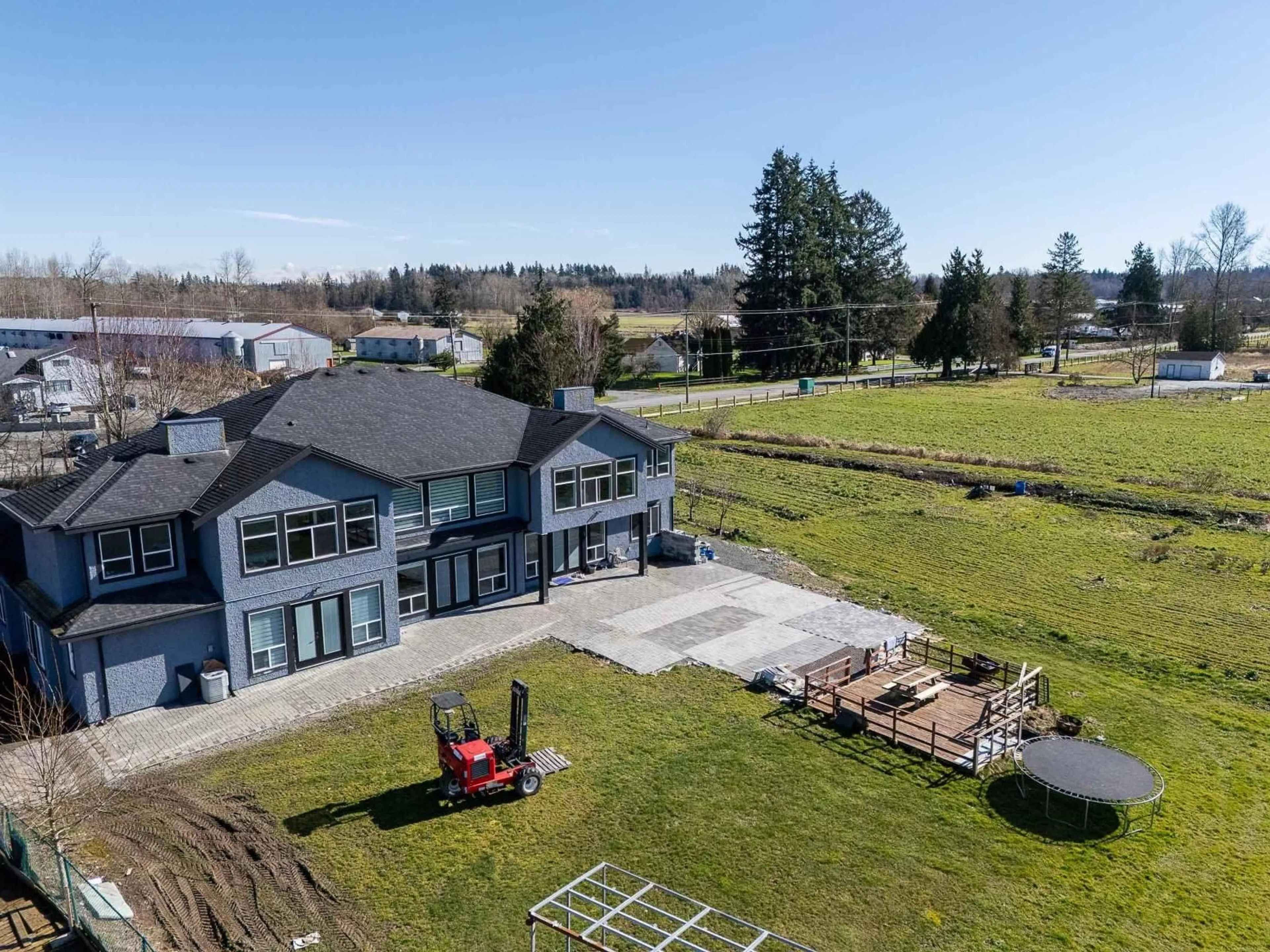 A pic from outside/outdoor area/front of a property/back of a property/a pic from drone, building for 4371 184 STREET, Surrey British Columbia V3Z1B7