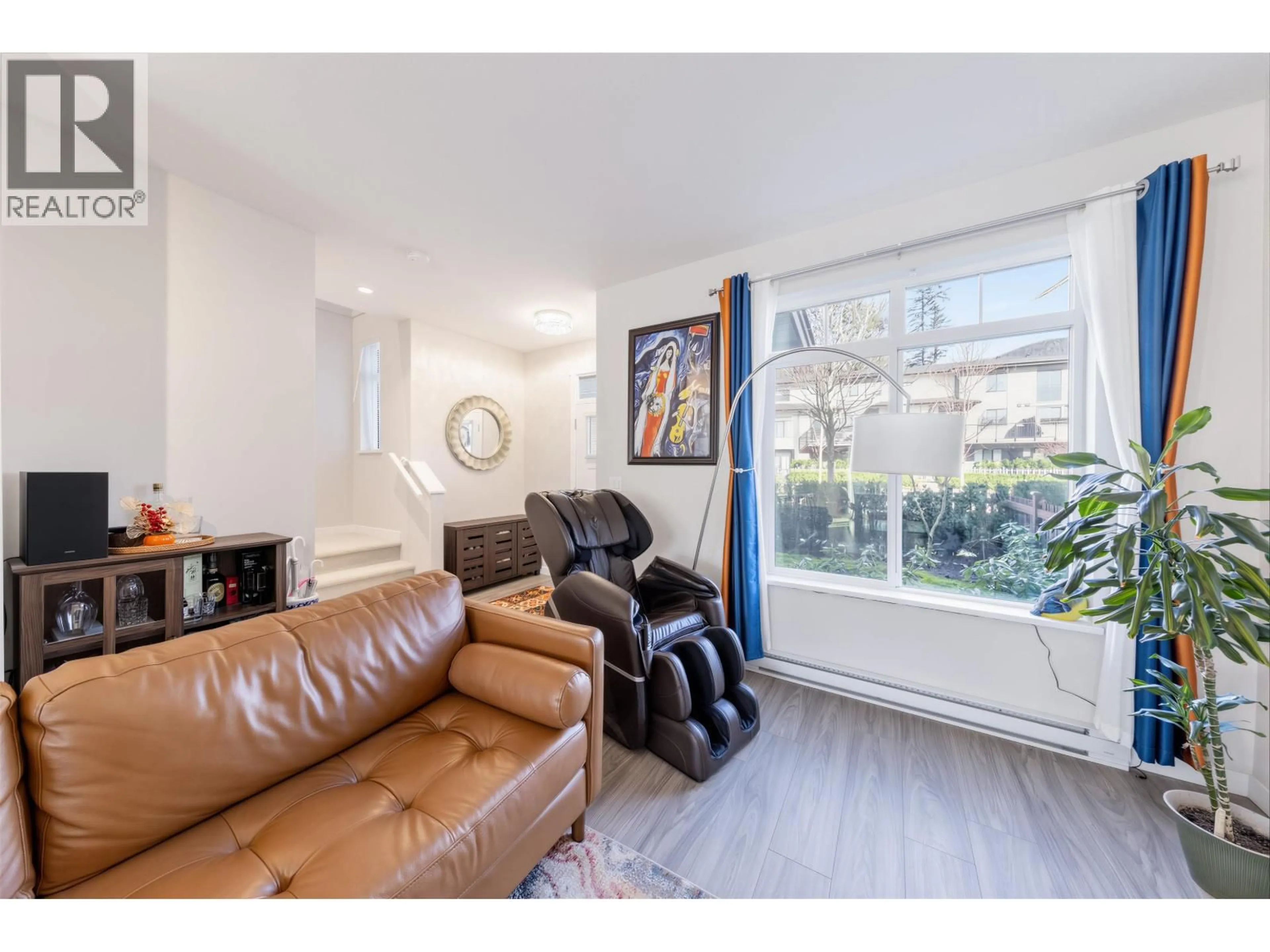 Living room with furniture, wood/laminate floor for 117 - 1350 MITCHELL STREET, Coquitlam British Columbia V3E0S7