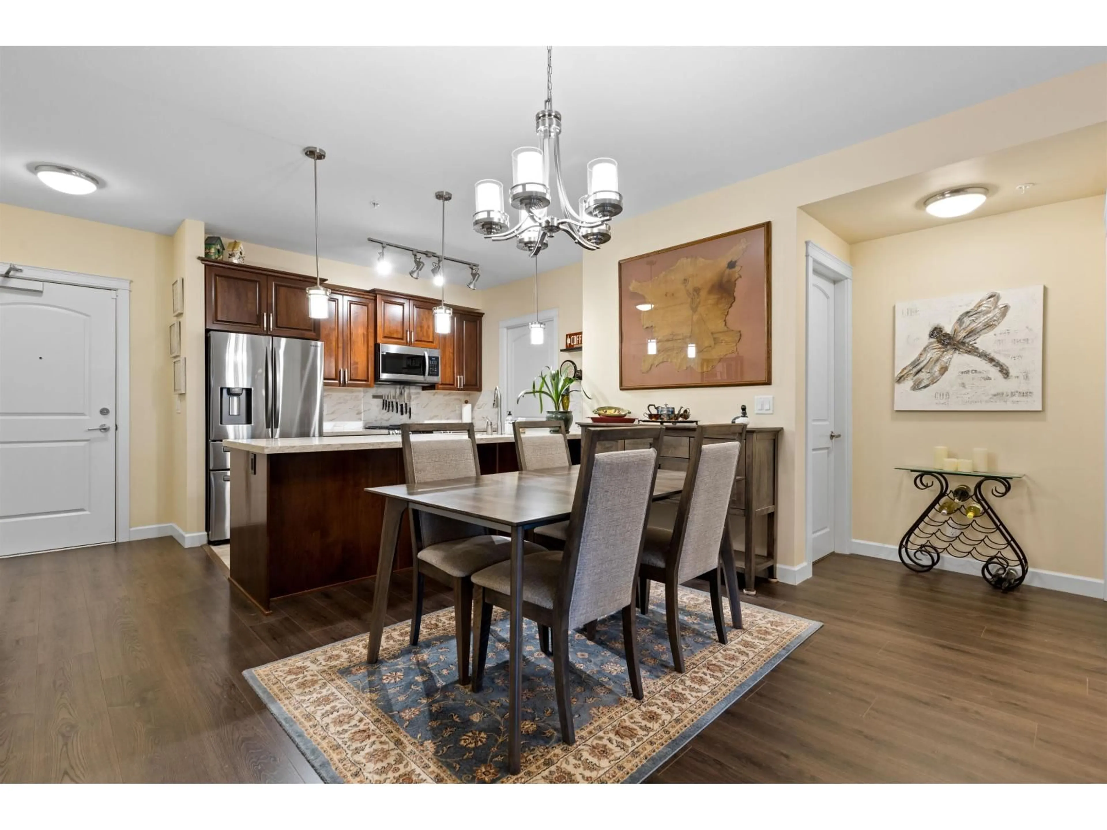 Open concept kitchen, wood/laminate floor for 204 - 20376 86 AVENUE, Langley British Columbia V2Y2C2
