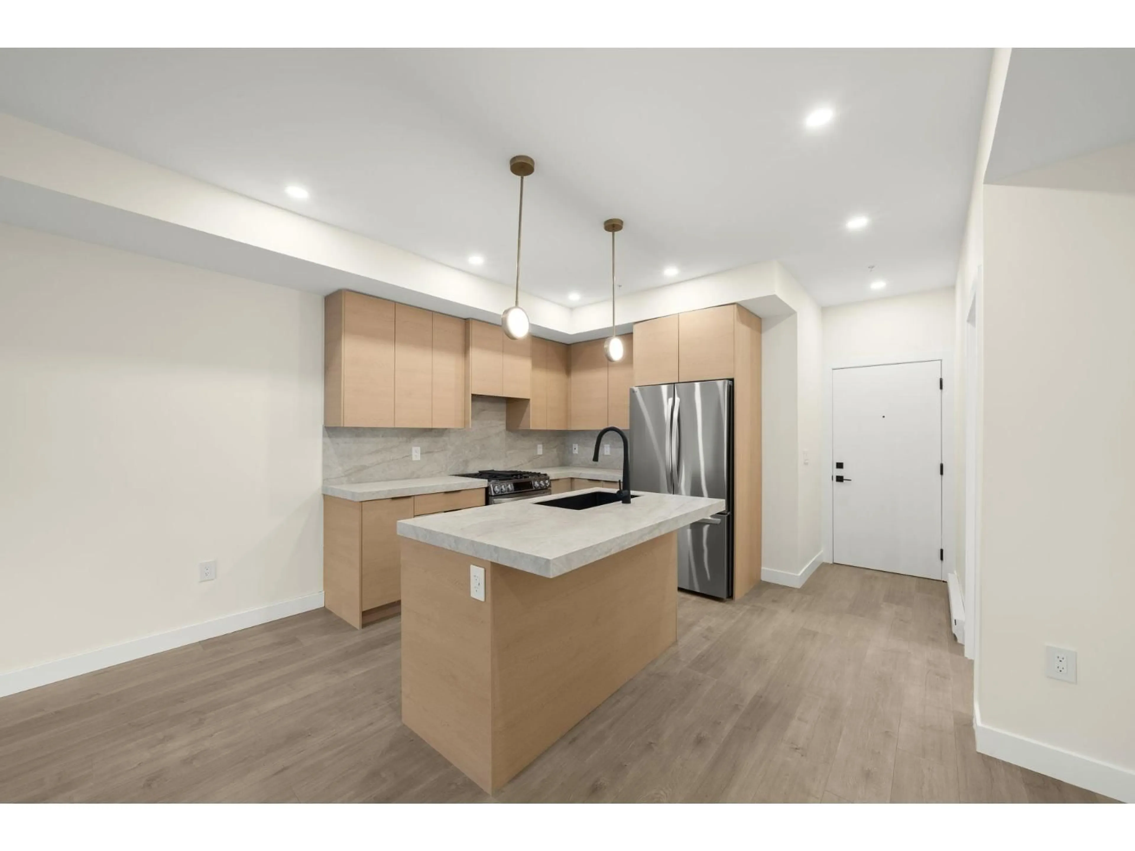 Open concept kitchen, unknown for 211 - 15353 17 AVENUE, Surrey British Columbia V4A1T8