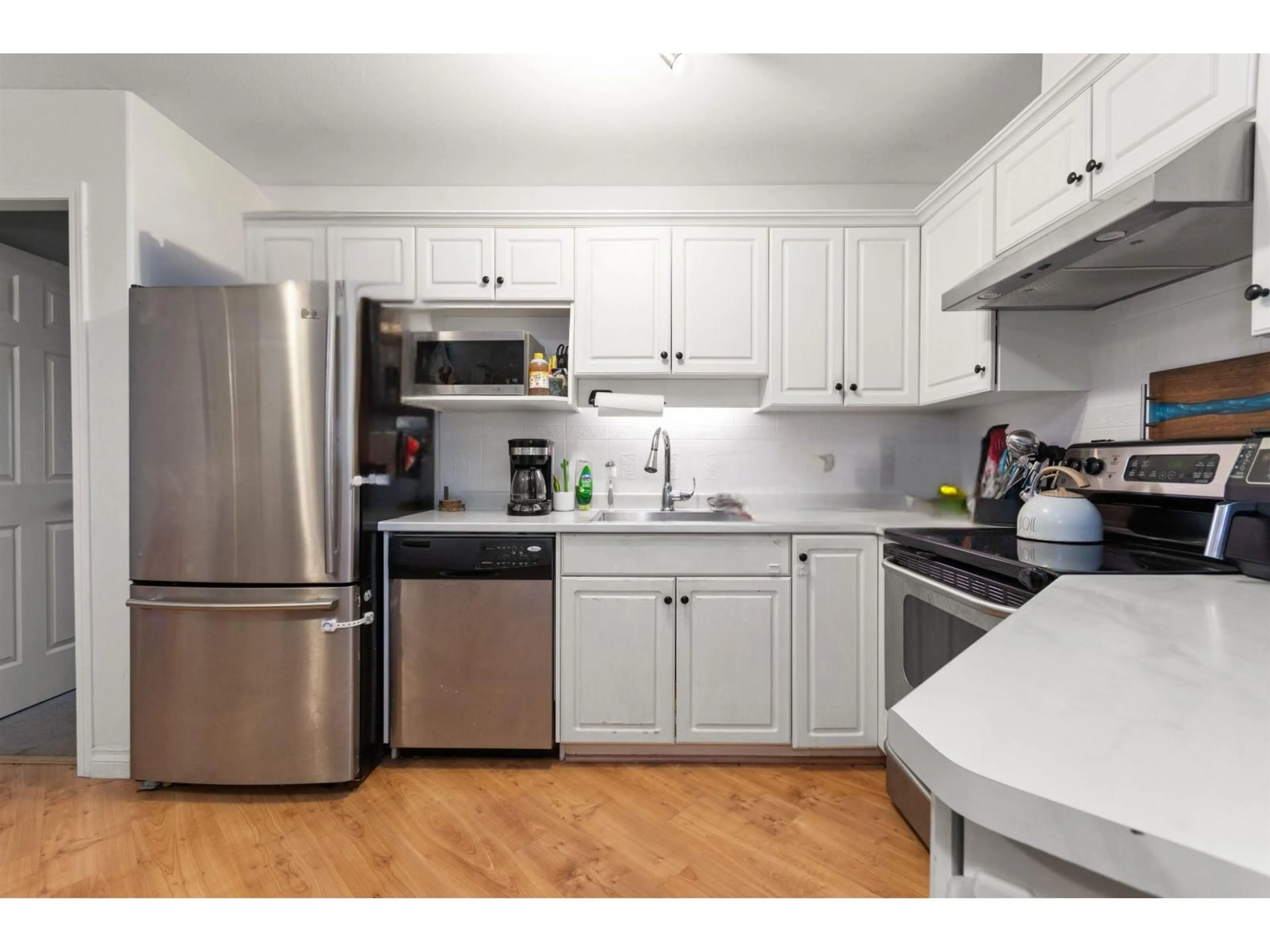 Standard kitchen, wood/laminate floor for 308 - 5765 VEDDER ROAD, Chilliwack British Columbia V2R1C3