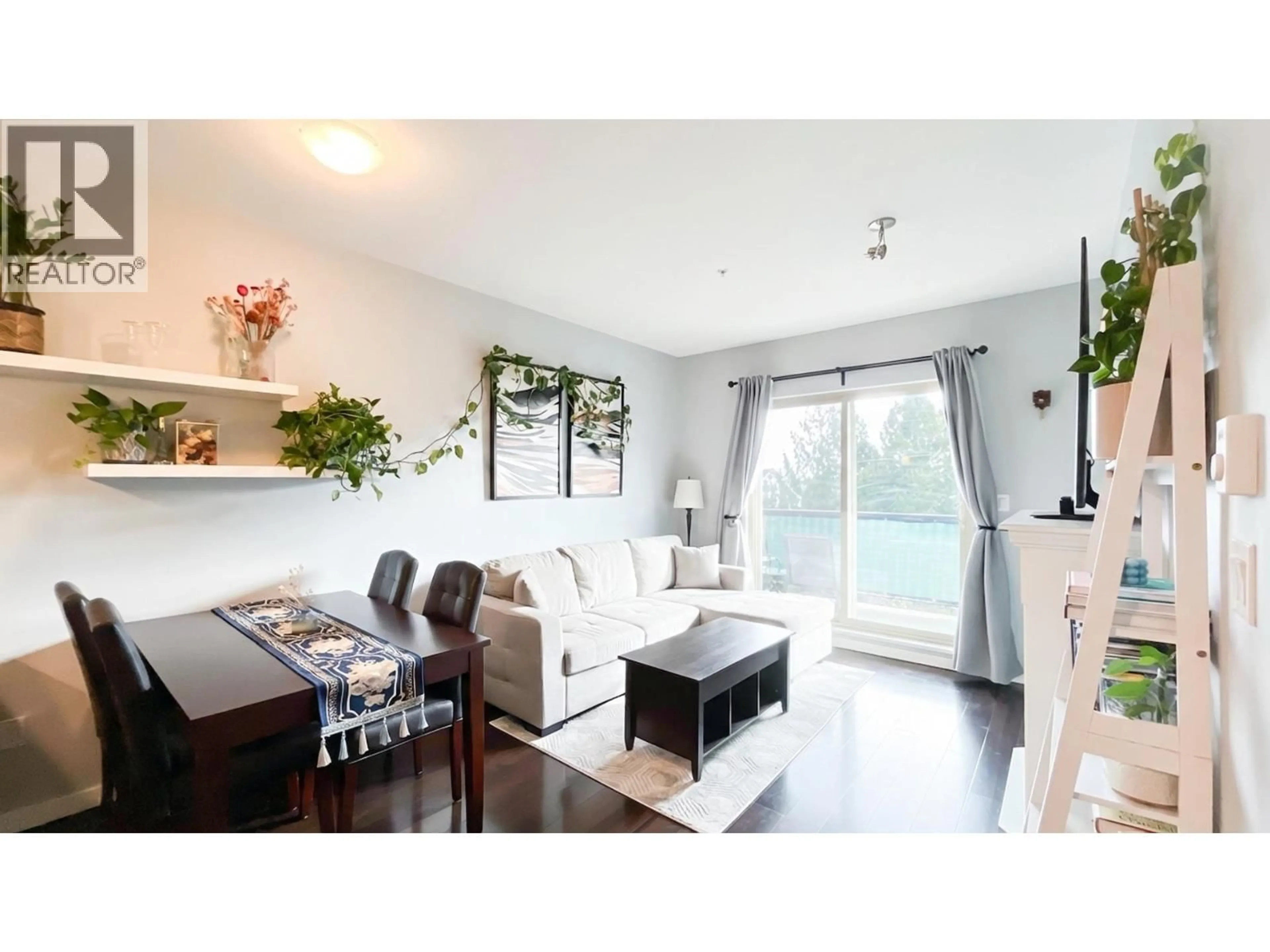 Living room with furniture, wood/laminate floor for 308 - 22290 NORTH AVENUE, Maple Ridge British Columbia V2X8Z8