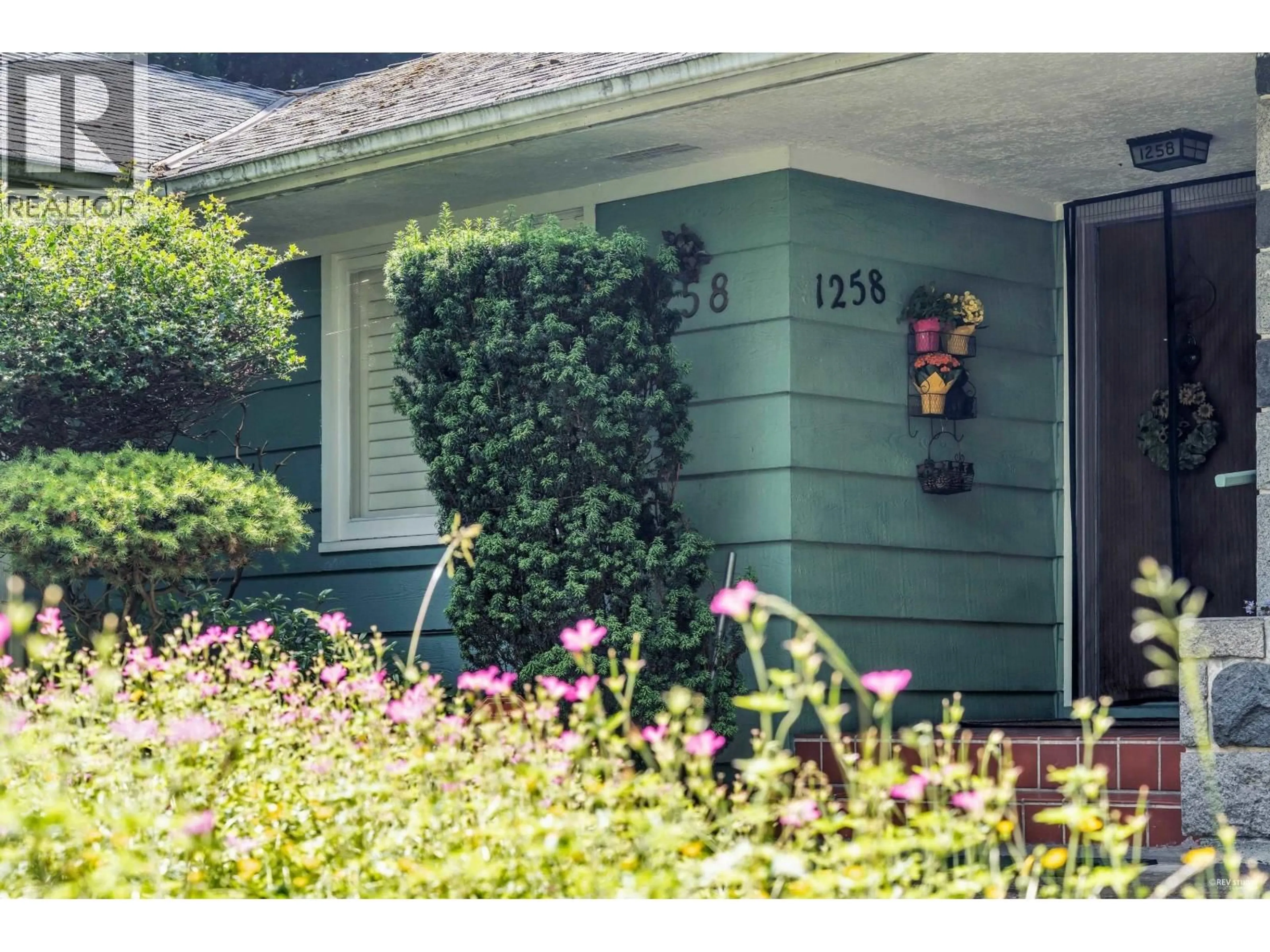 Home with vinyl exterior material, street for 1258 33RD AVENUE, Vancouver British Columbia V6M1A5