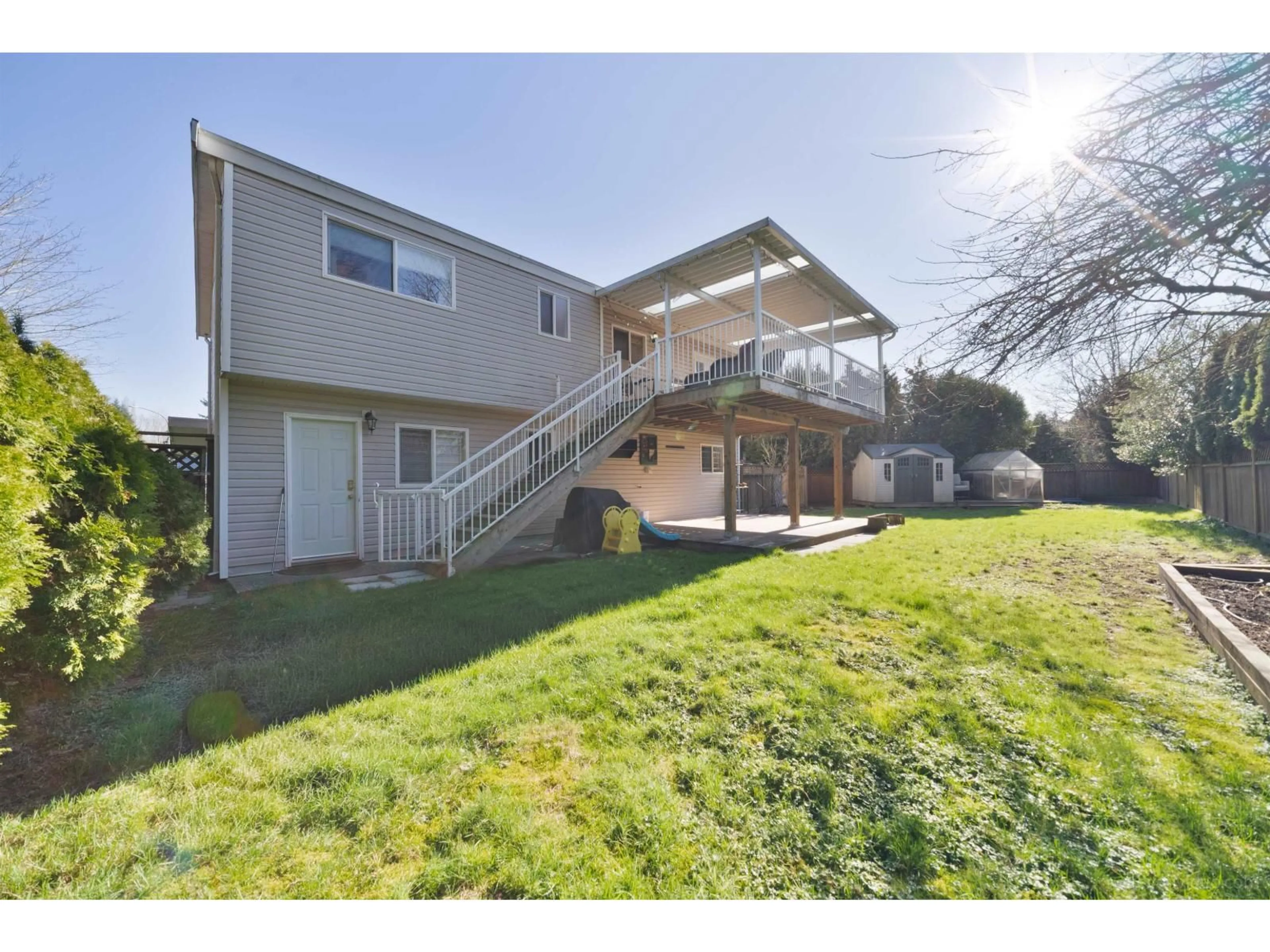 A pic from outside/outdoor area/front of a property/back of a property/a pic from drone, unknown for 5003 205 STREET, Langley British Columbia V3A5P8