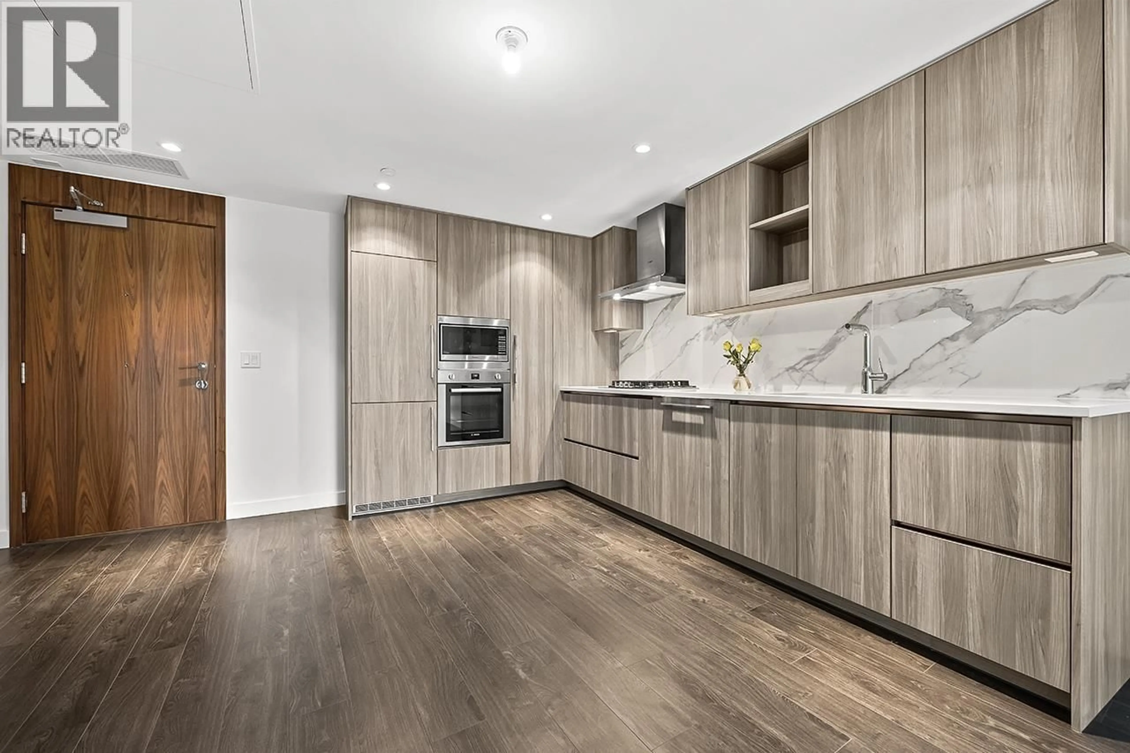 Open concept kitchen, wood/laminate floor for 685 - 8671 HAZELBRIDGE WAY, Richmond British Columbia V6X0W9