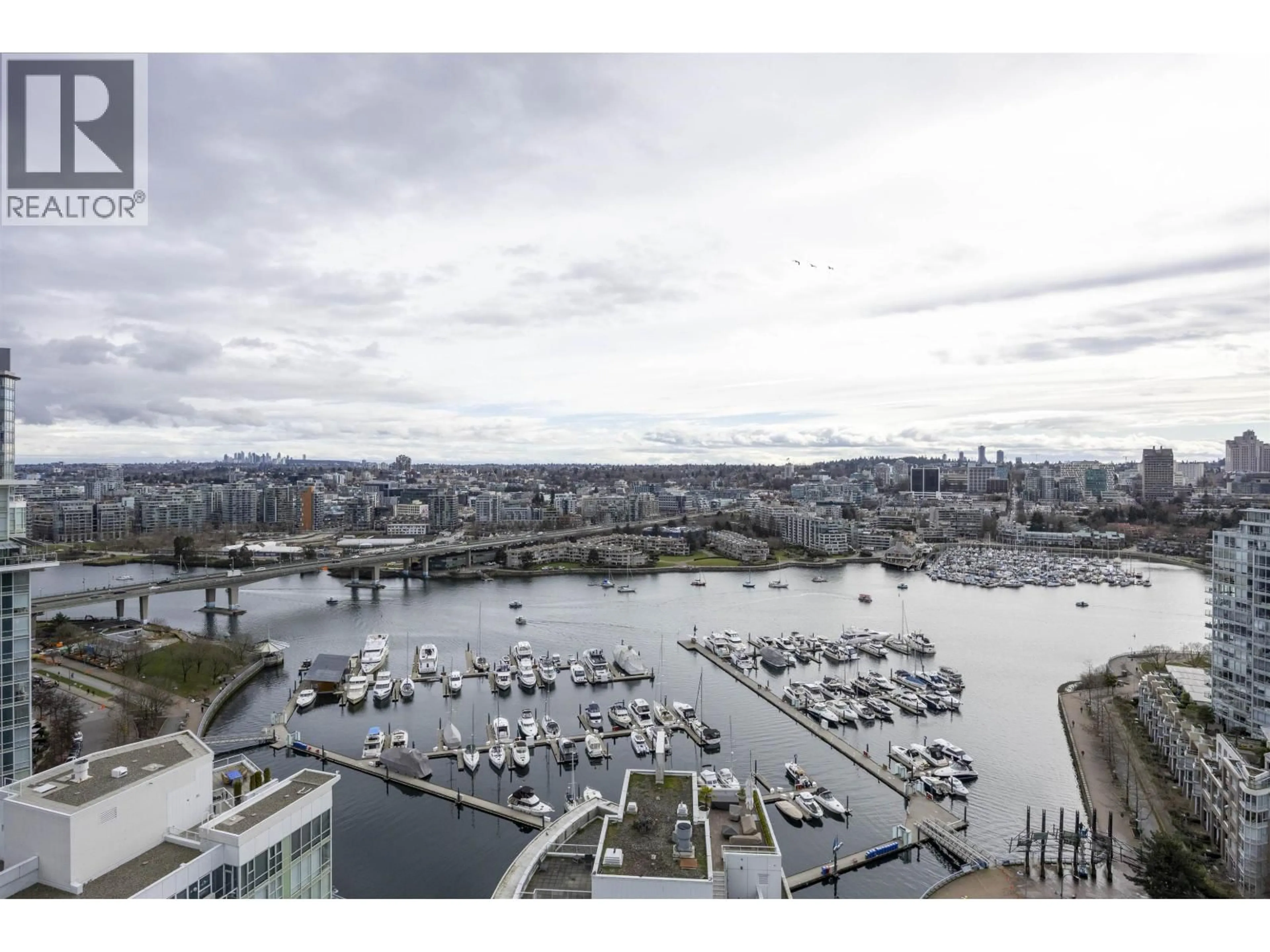 A pic from outside/outdoor area/front of a property/back of a property/a pic from drone, water/lake/river/ocean view for 2907 - 198 AQUARIUS MEWS, Vancouver British Columbia V6Z2Y4