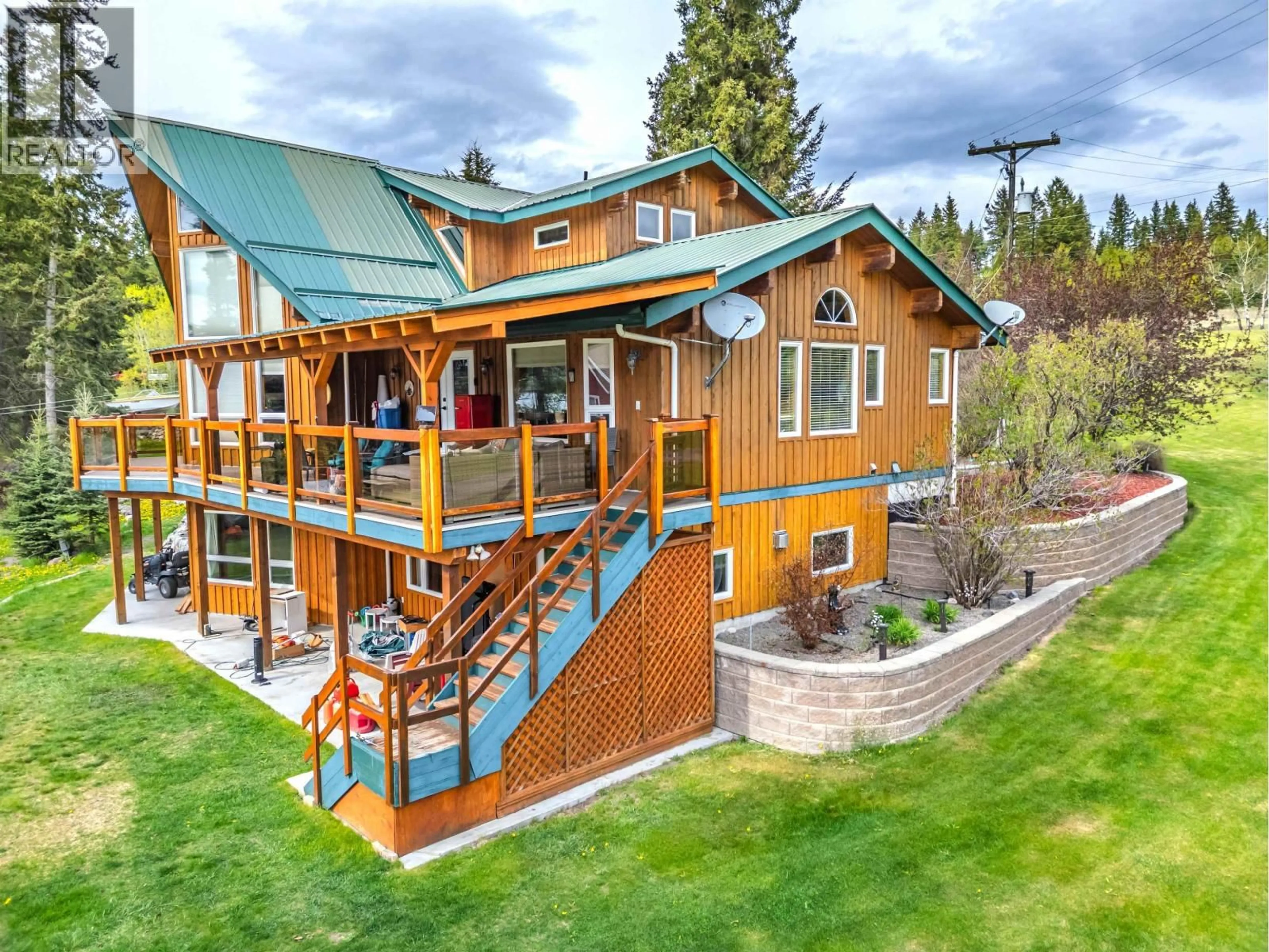 A pic from outside/outdoor area/front of a property/back of a property/a pic from drone, mountain view for 3544 CABIN ROAD, Lac La Hache British Columbia V0K1T1