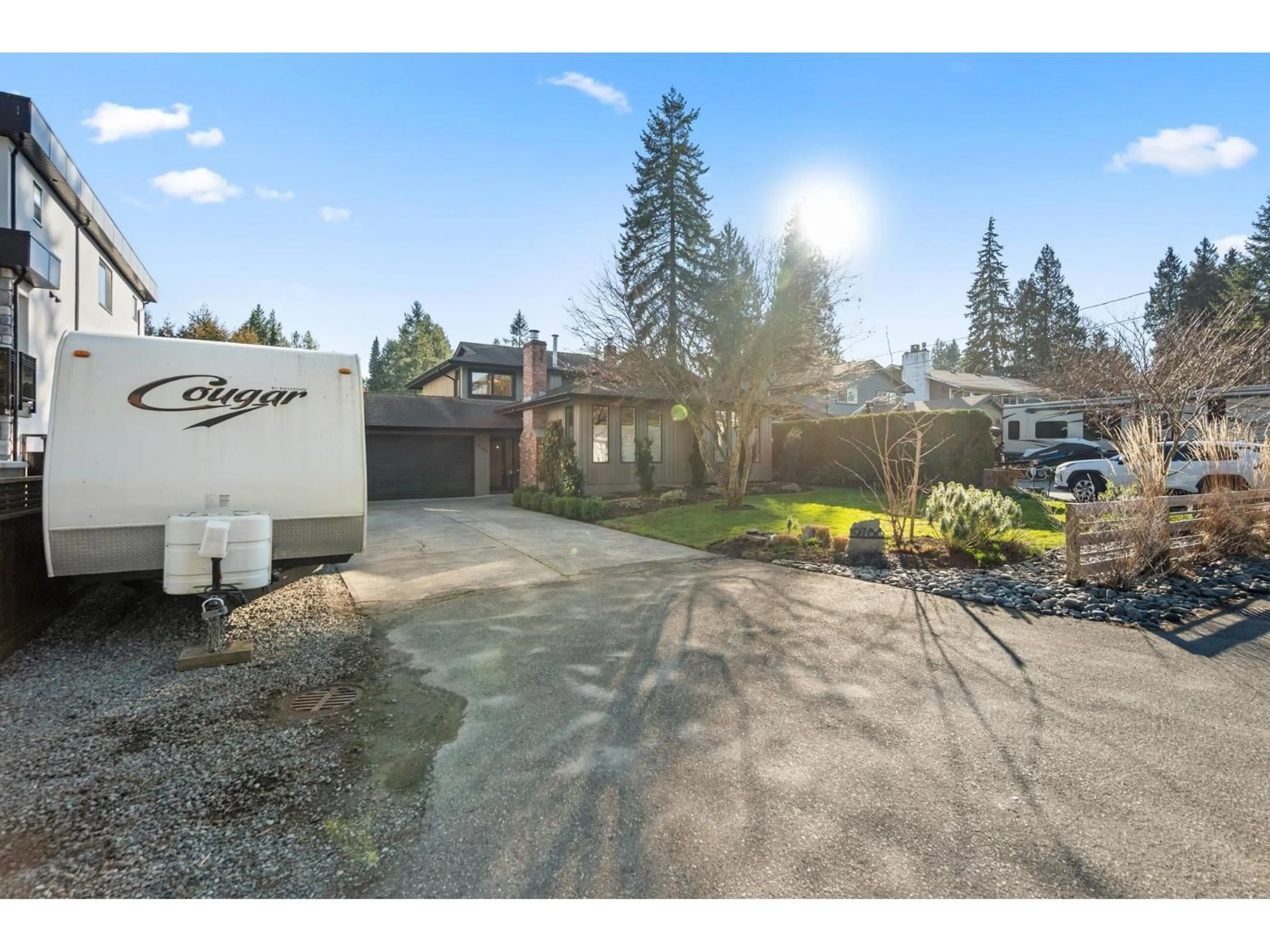 A pic from outside/outdoor area/front of a property/back of a property/a pic from drone, street for 19788 49 AVENUE, Langley British Columbia V3A3R4