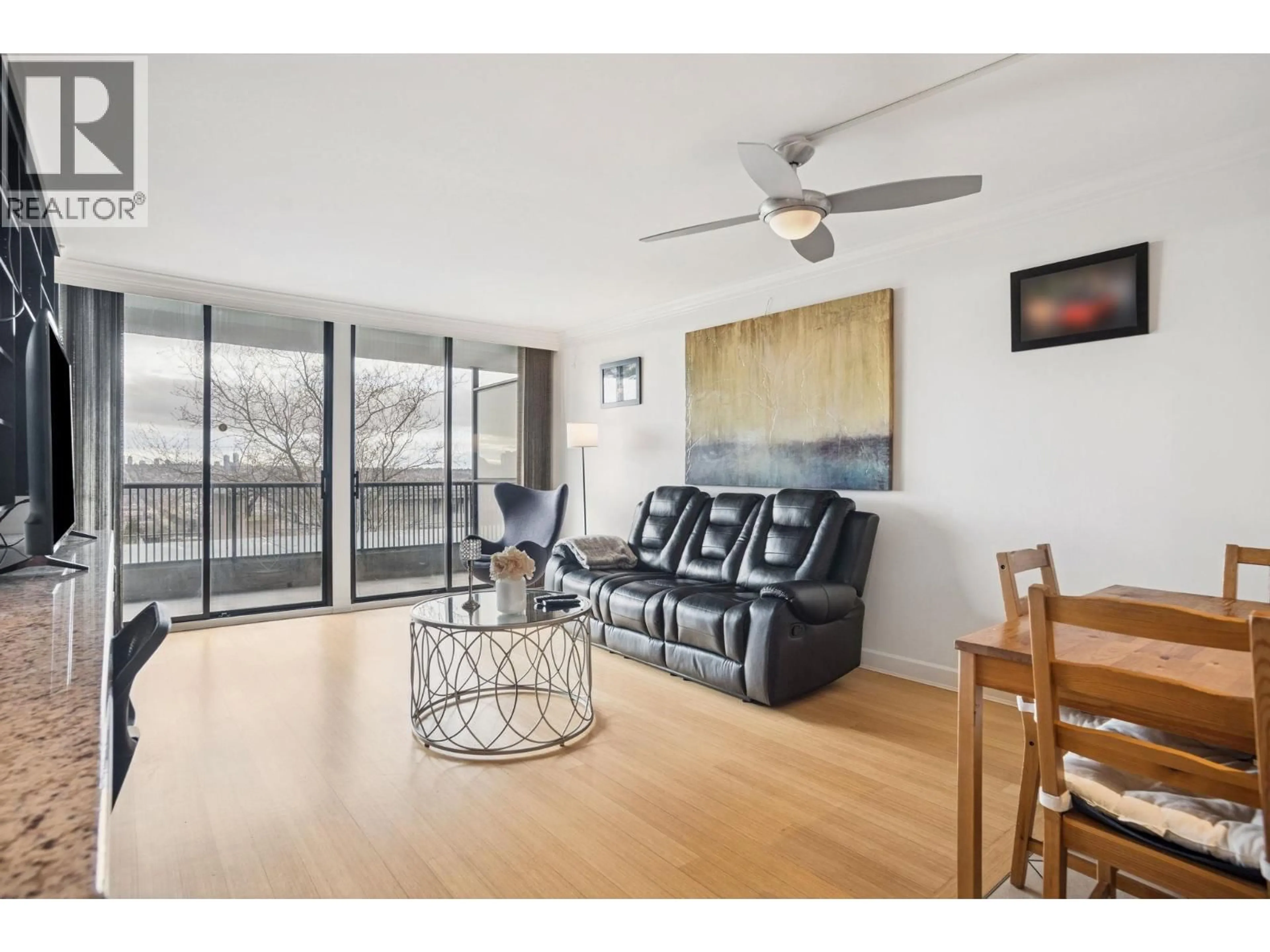 Living room with furniture, wood/laminate floor for 106 - 3740 ALBERT STREET, Burnaby British Columbia V5C5Y7