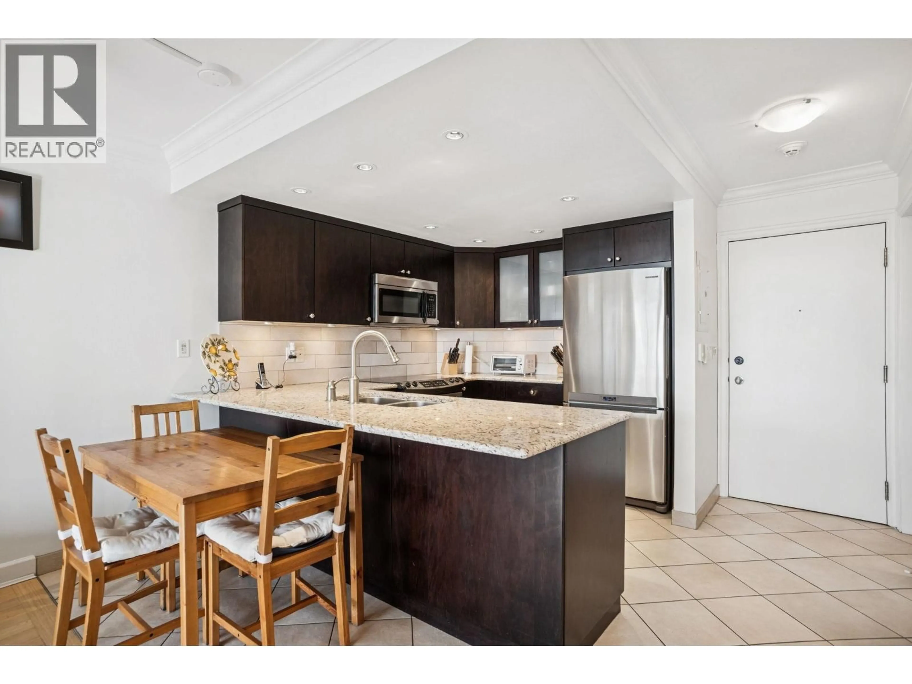 Open concept kitchen, ceramic/tile floor for 106 - 3740 ALBERT STREET, Burnaby British Columbia V5C5Y7