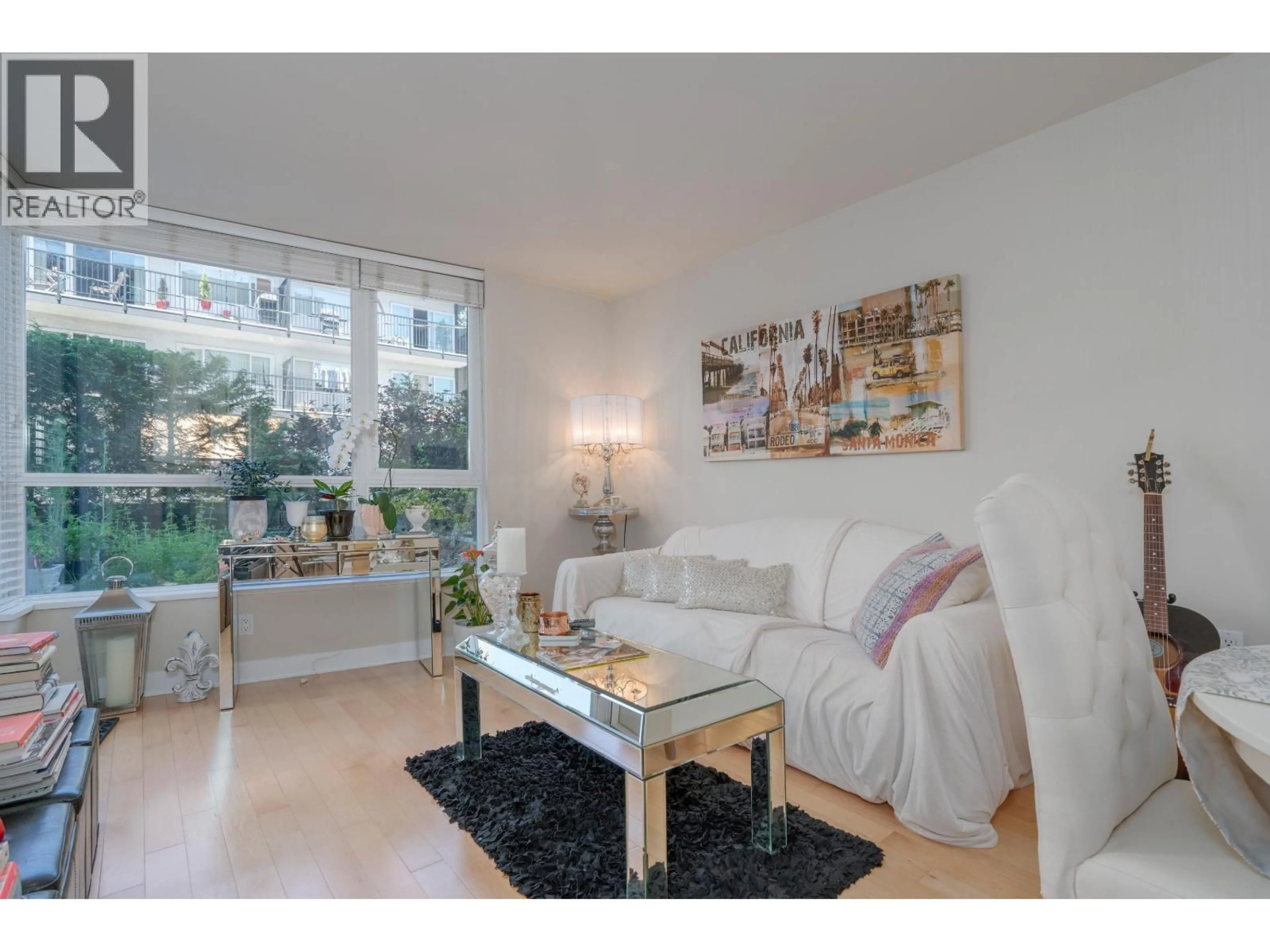 Living room with furniture, unknown for 302 - 160 3RD STREET, North Vancouver British Columbia V7M0A9