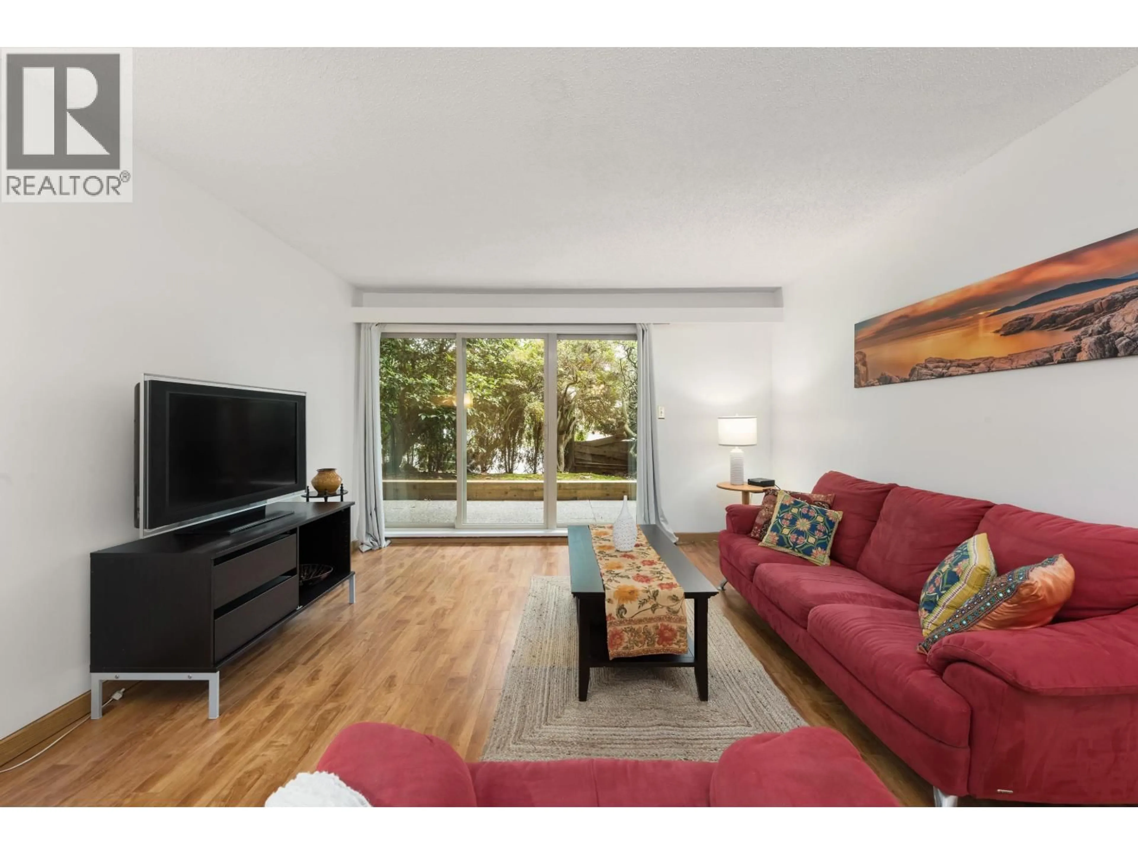 Living room with furniture, wood/laminate floor for 227 - 9847 MANCHESTER DRIVE, Burnaby British Columbia V3N4P4