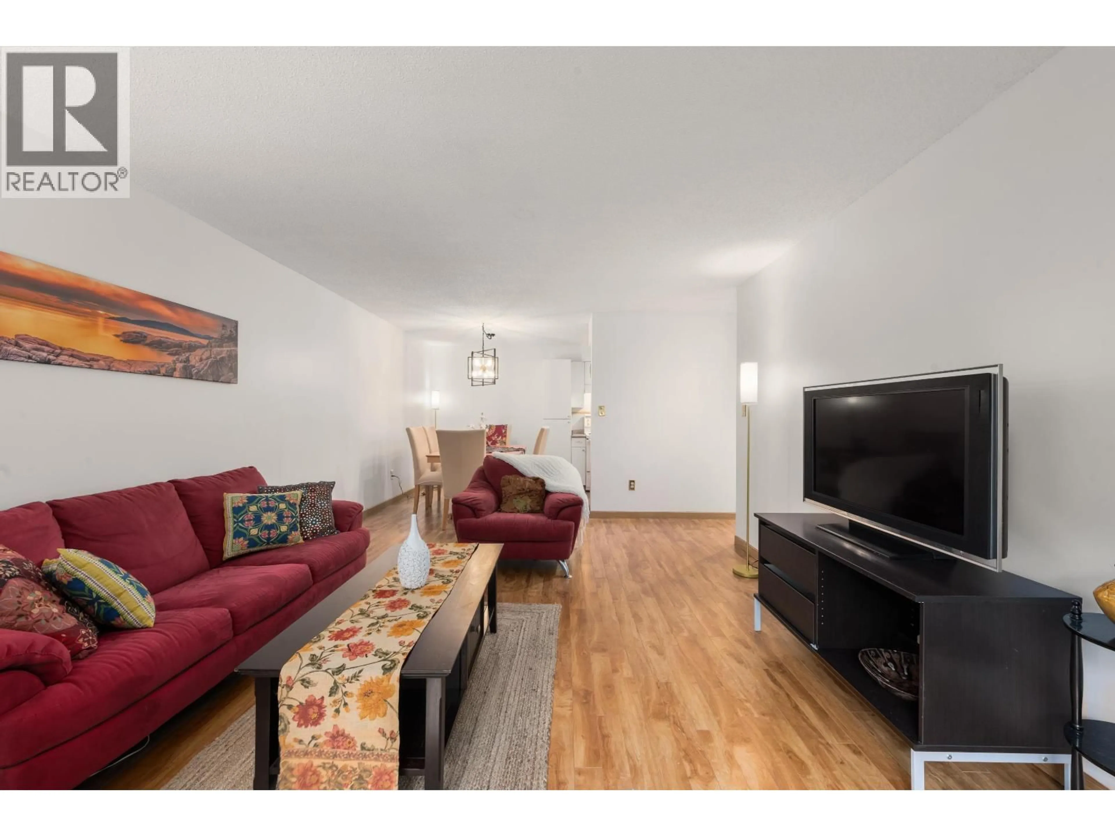 Living room with furniture, wood/laminate floor for 227 - 9847 MANCHESTER DRIVE, Burnaby British Columbia V3N4P4