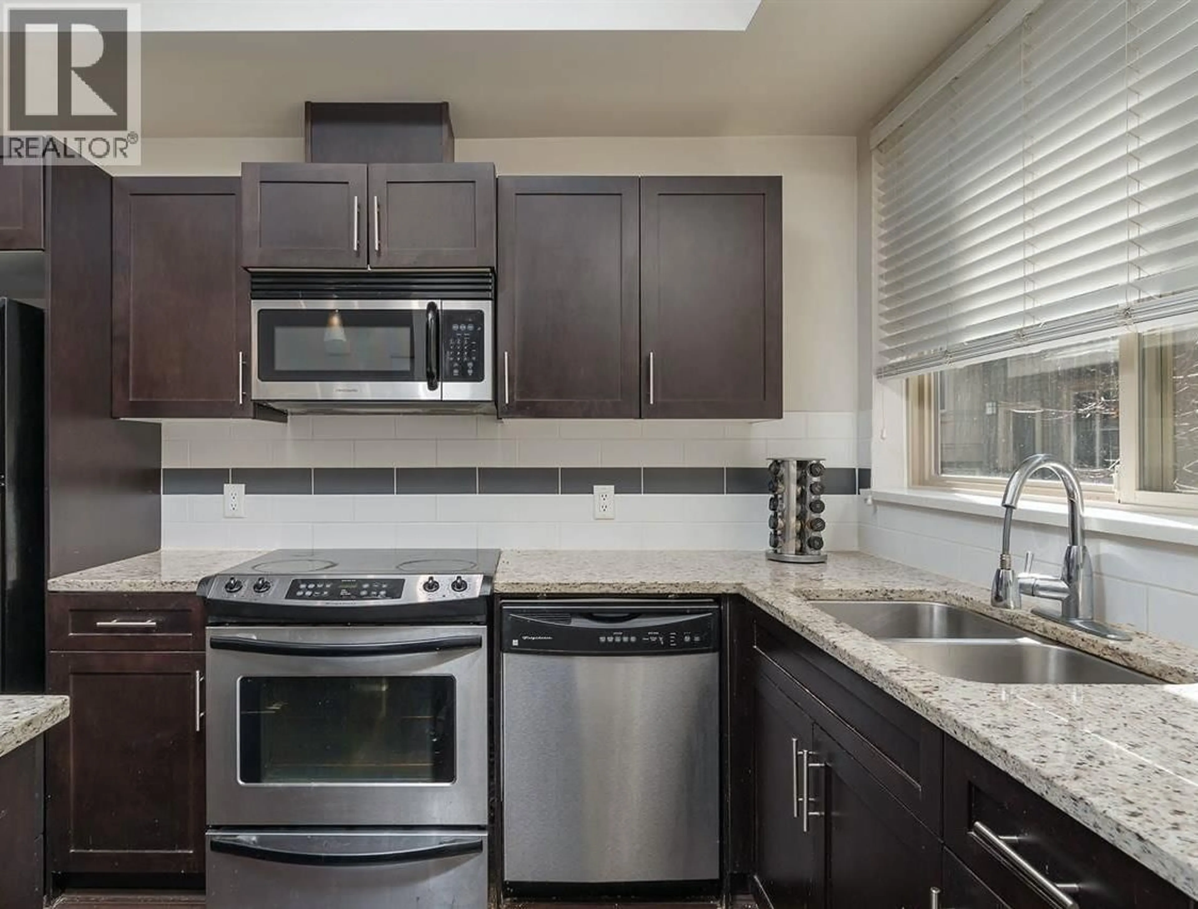 Standard kitchen, ceramic/tile floor for 228 - 2108 ROWLAND STREET, Port Coquitlam British Columbia V3C0C1