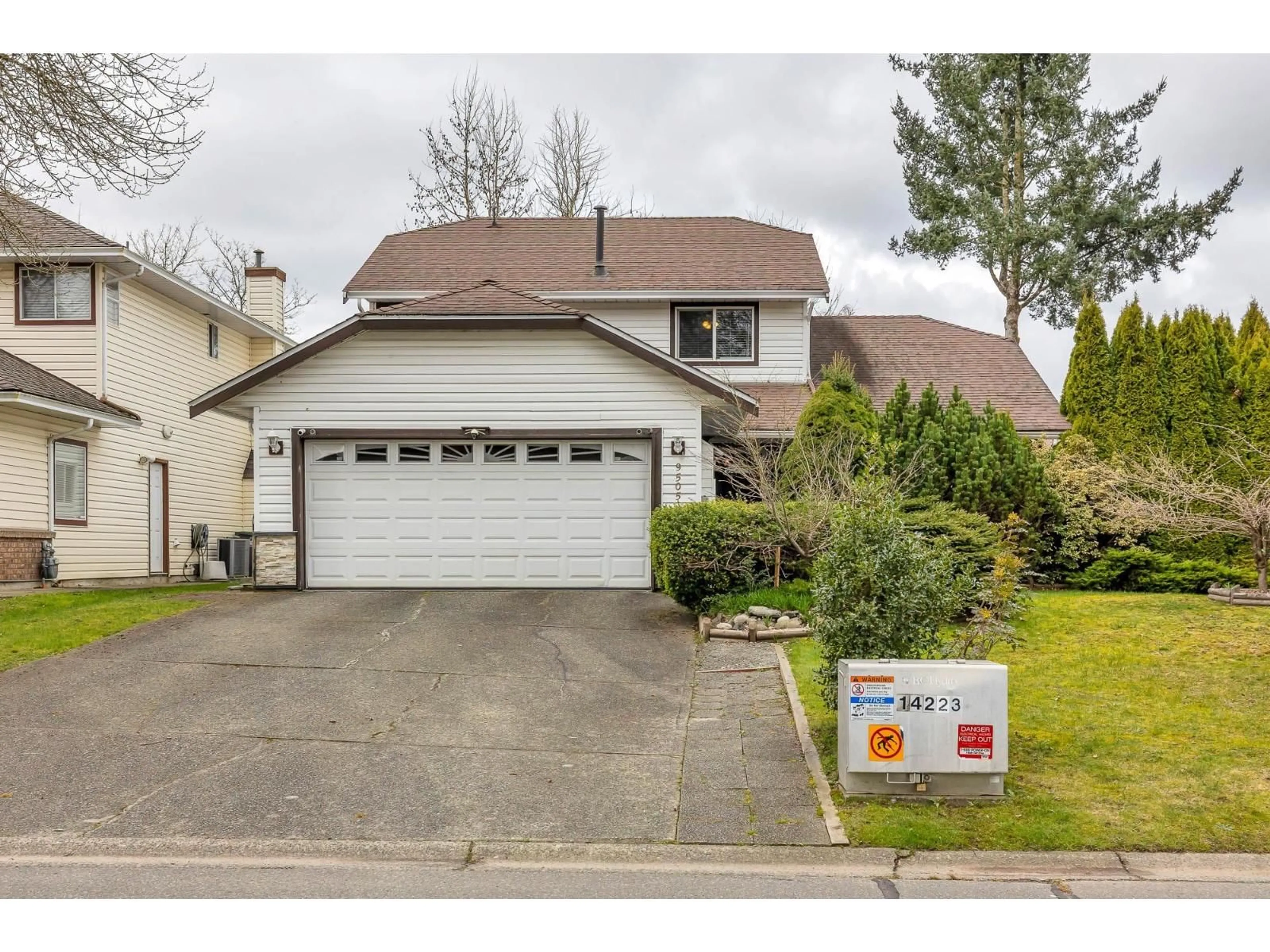 Home with vinyl exterior material, street for 9505 161 STREET, Surrey British Columbia V4N2P3