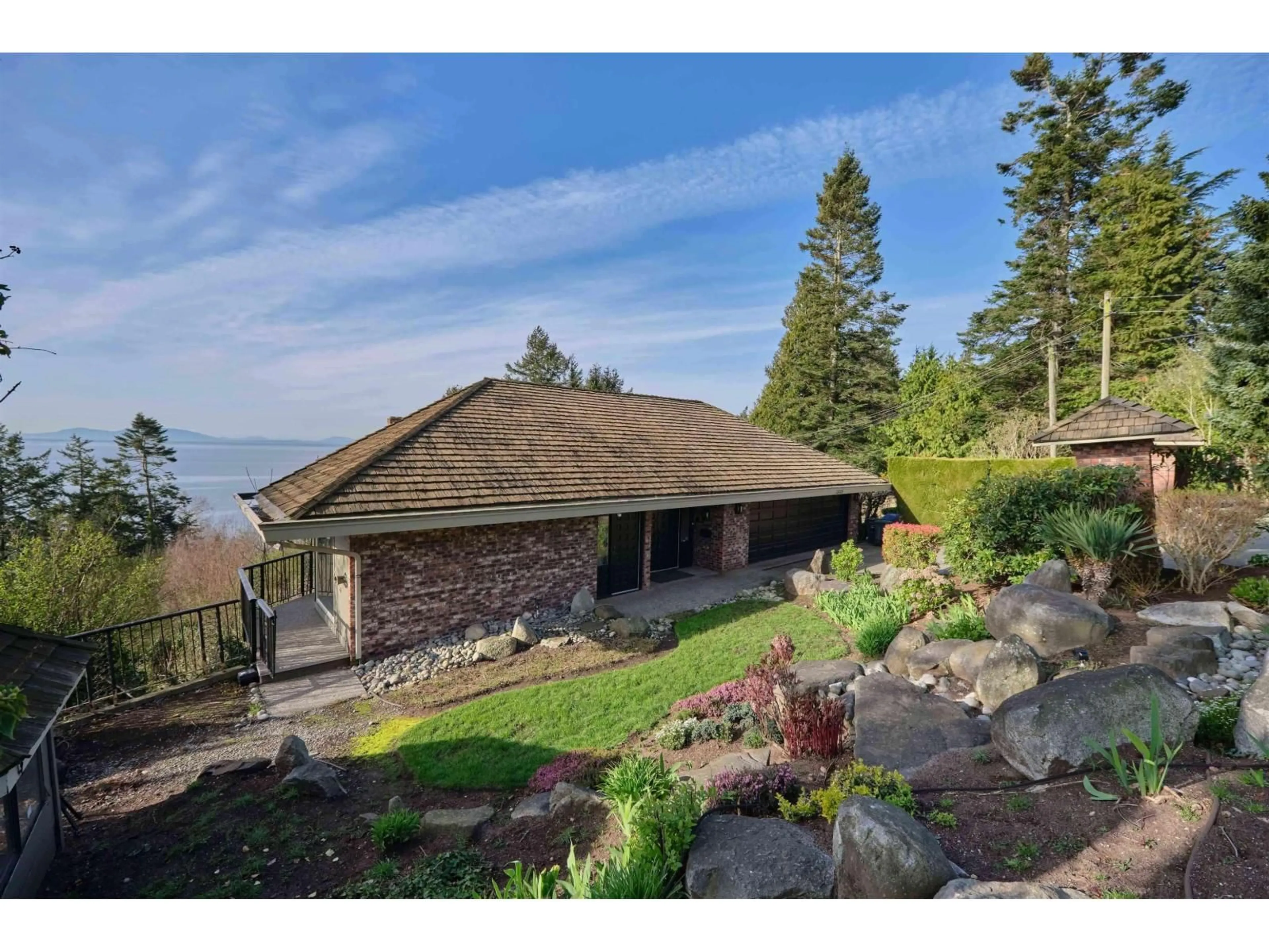 A pic from outside/outdoor area/front of a property/back of a property/a pic from drone, water/lake/river/ocean view for 13026 13 AVENUE, Surrey British Columbia V4A1B8
