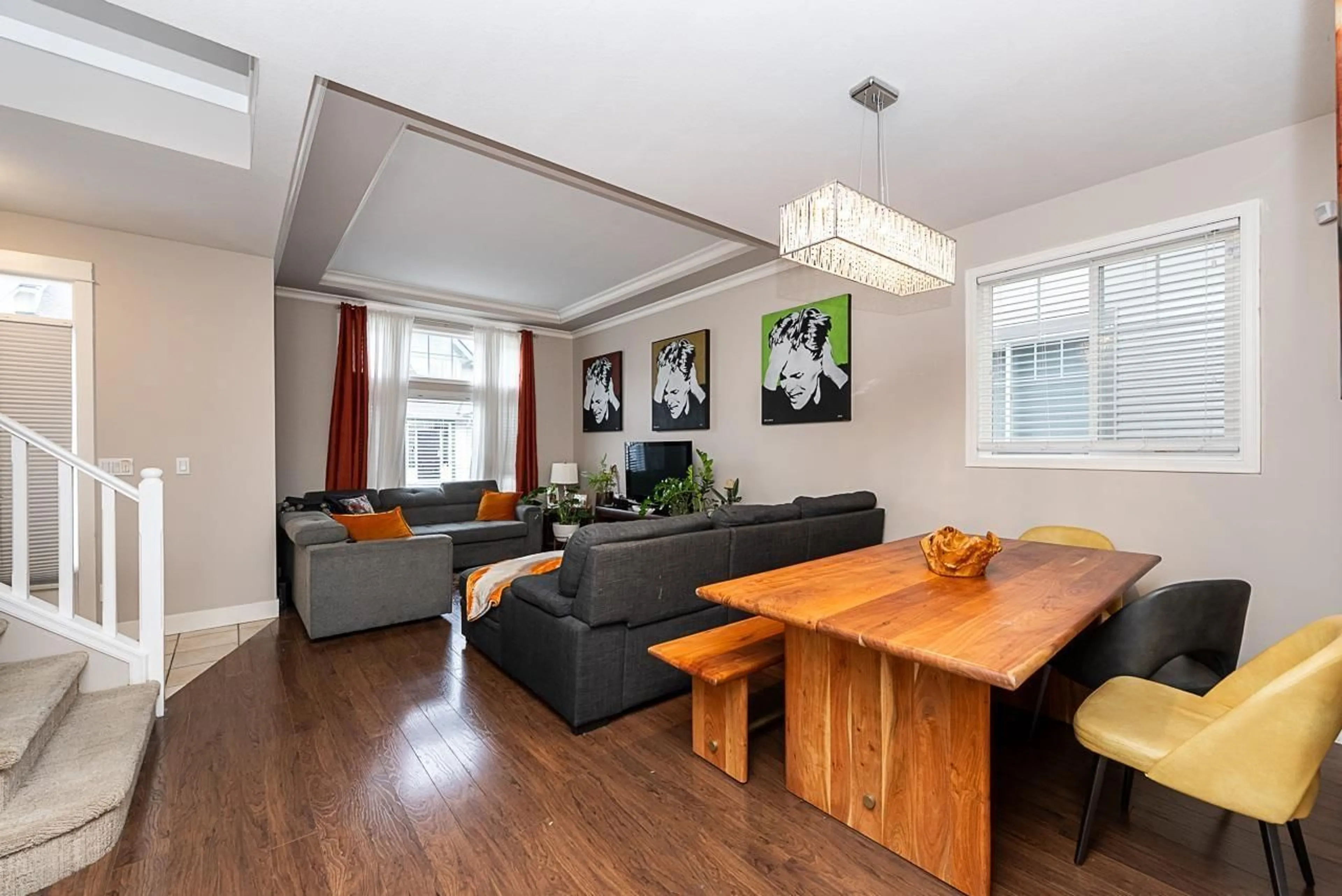 Living room with furniture, wood/laminate floor for 4 - 6177 169 STREET, Surrey British Columbia V3S9E8