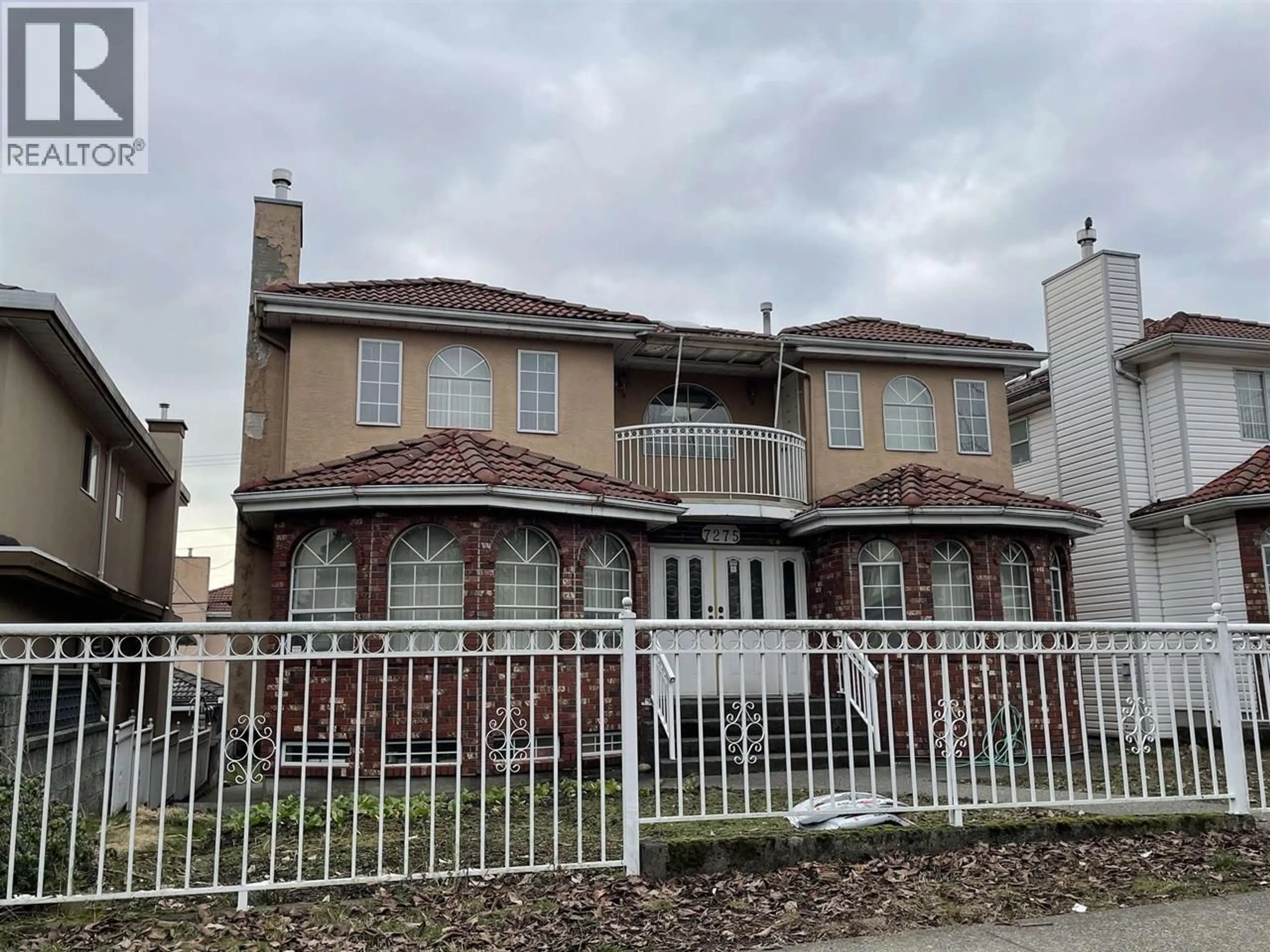 Home with brick exterior material, street for 7275 VICTORIA DRIVE, Vancouver British Columbia V5P3Z2
