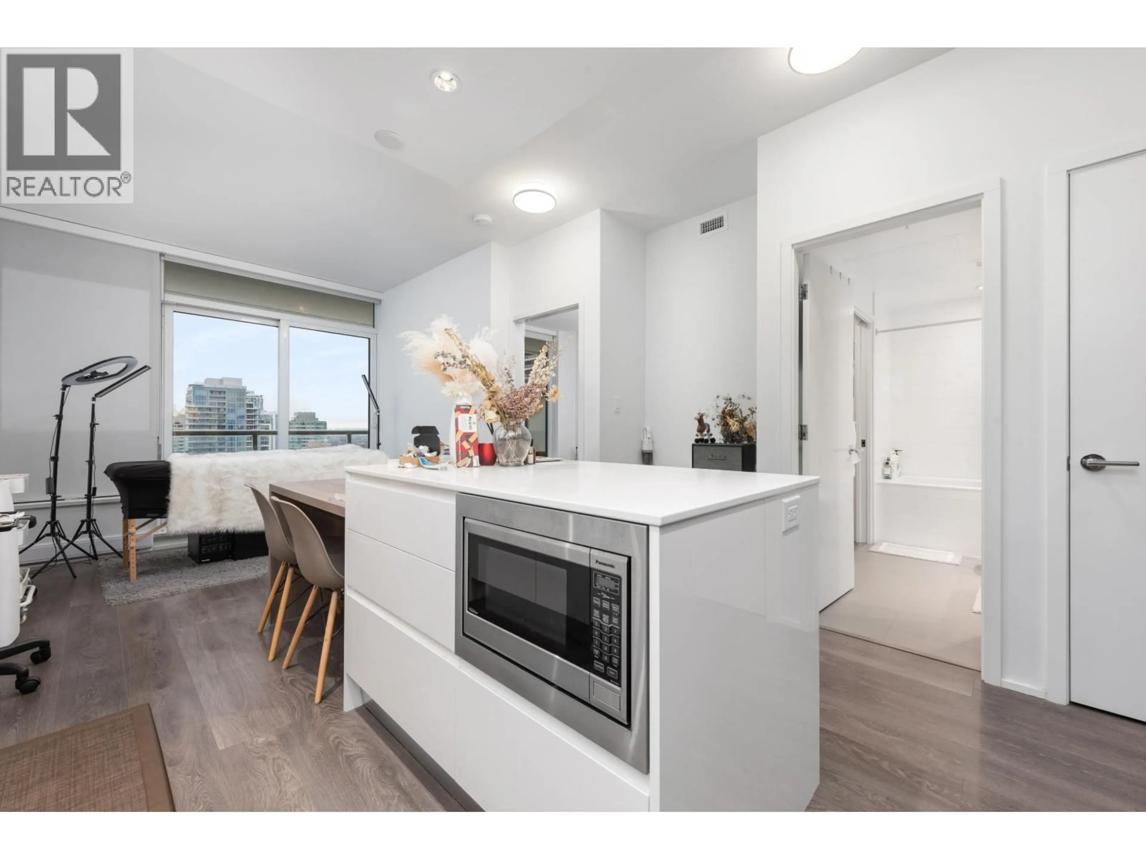 Open concept kitchen, wood/laminate floor for 1907 - 1955 ALPHA WAY, Burnaby British Columbia V5C0K6
