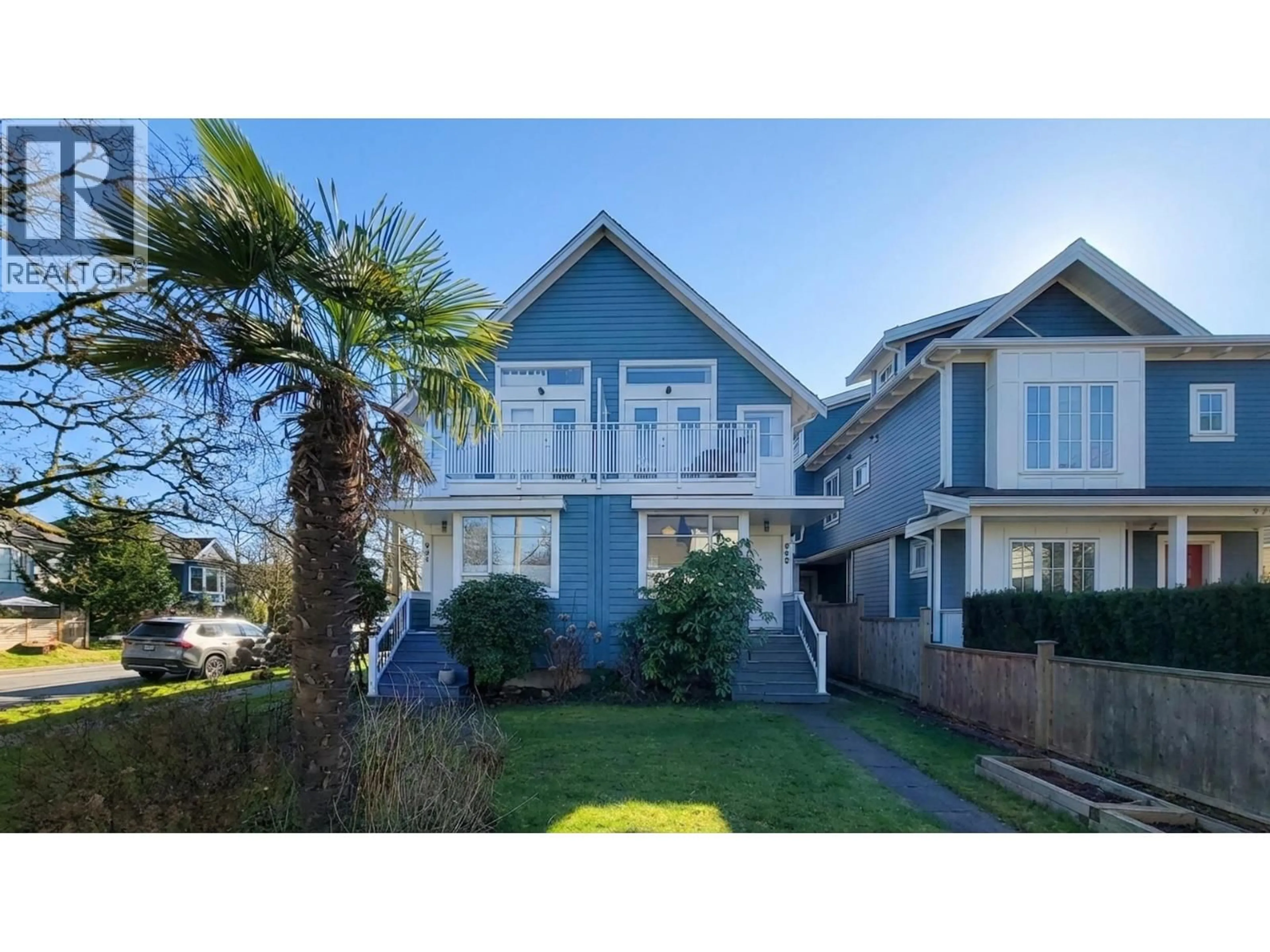 Home with vinyl exterior material, street for 990 13TH AVENUE, Vancouver British Columbia V5T2L6